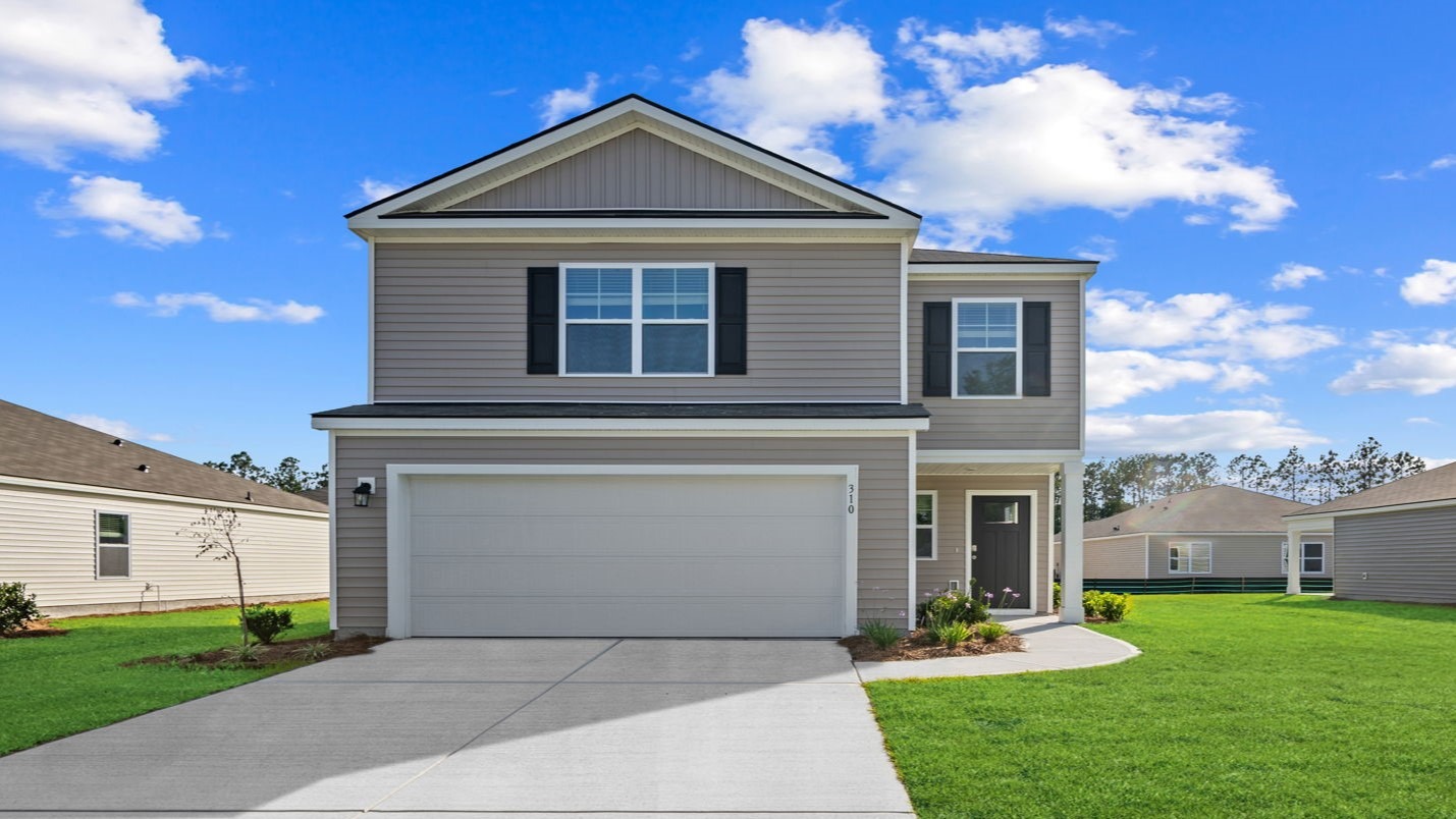 Manning floor plan by D.R. Horton featuring charming curb appeal, attached garage, and welcoming front porch.