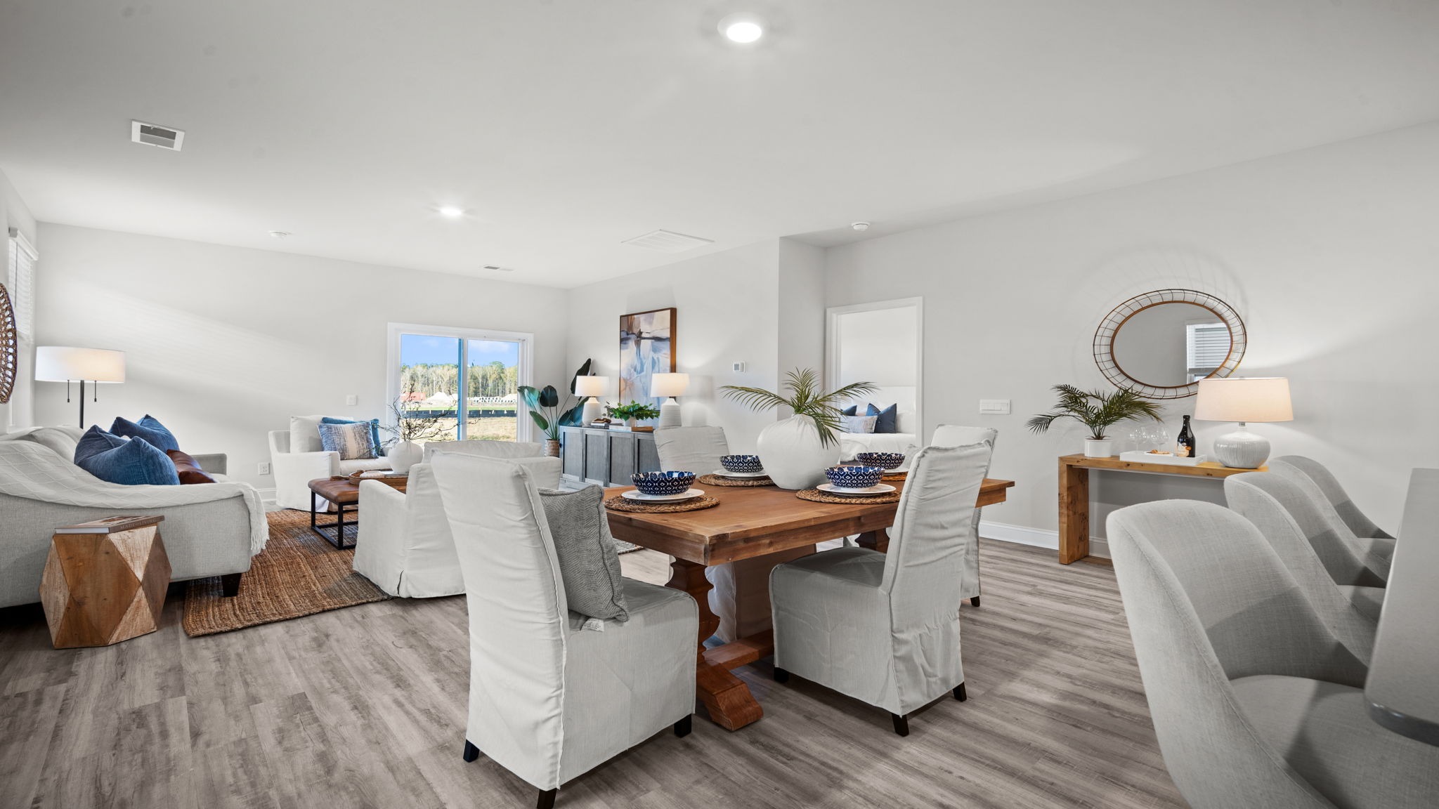 “Dining area in Manning floor plan with seamless flow to living room and kitchen in East Argent Ridgeland SC.”