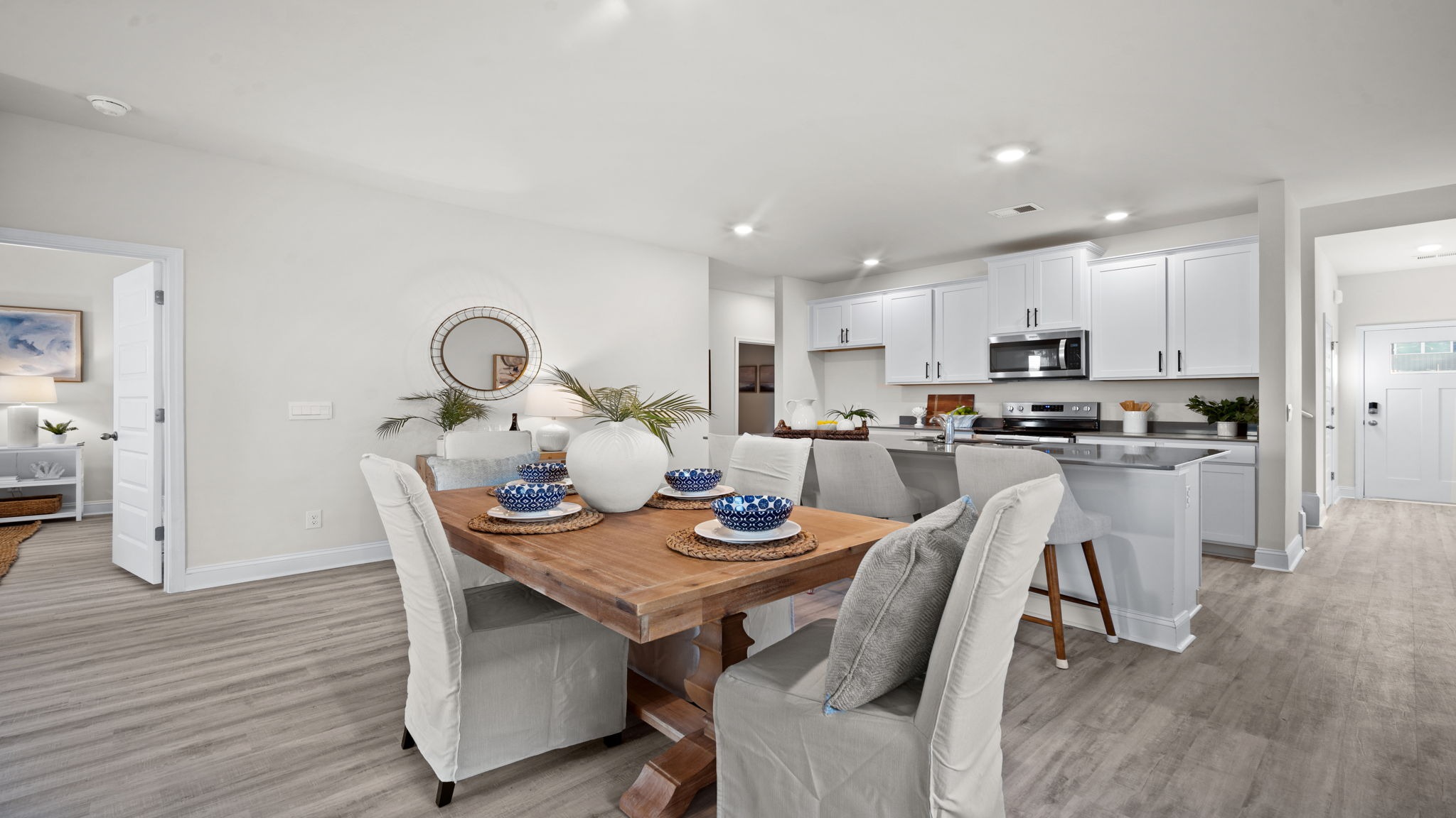 “Dining area in Manning floor plan with seamless flow to living room and kitchen in East Argent Ridgeland SC.”