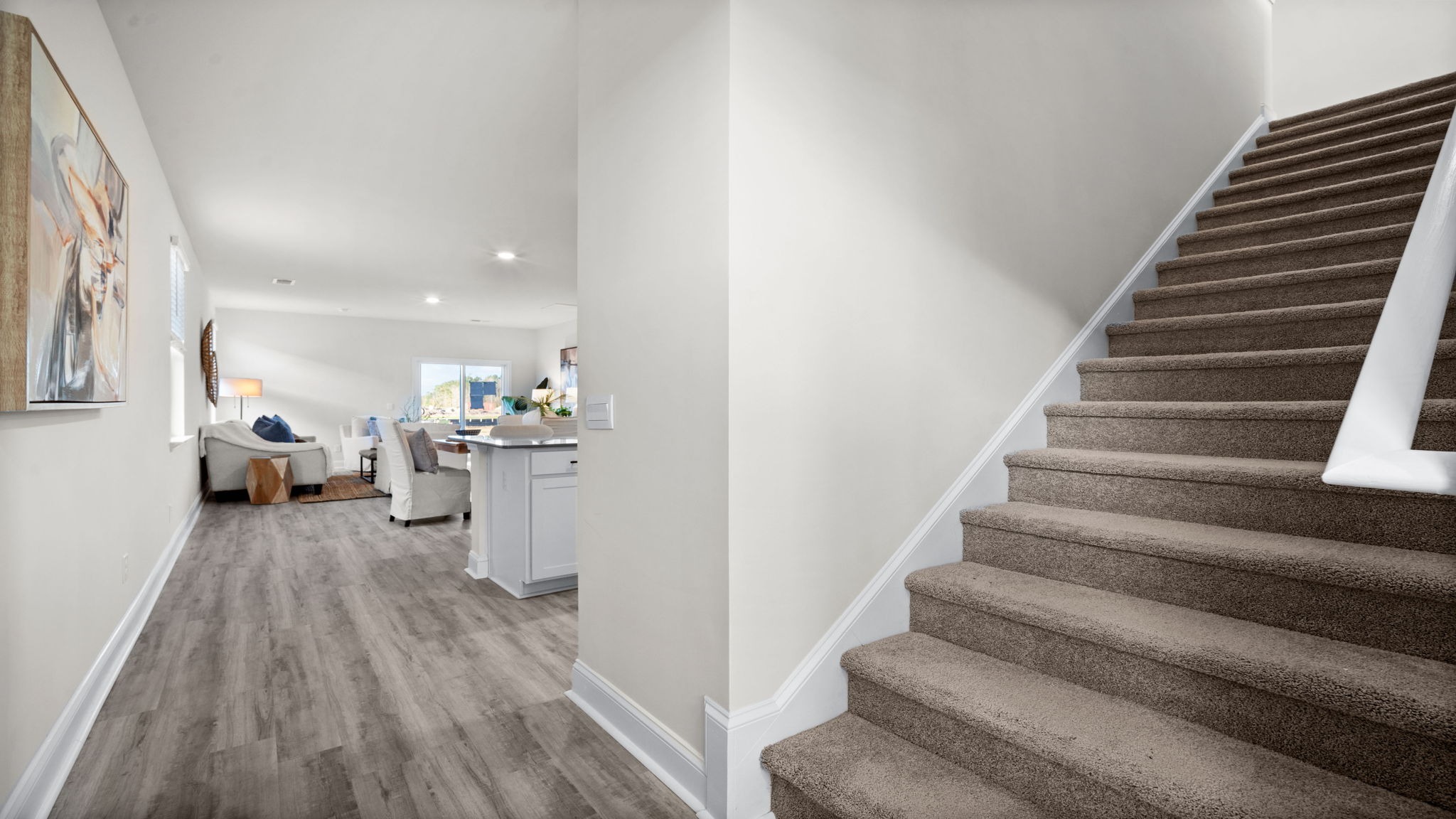 Welcoming foyer entry in Manning floor plan leading into open concept living space in Retreat at East Argent community.”
