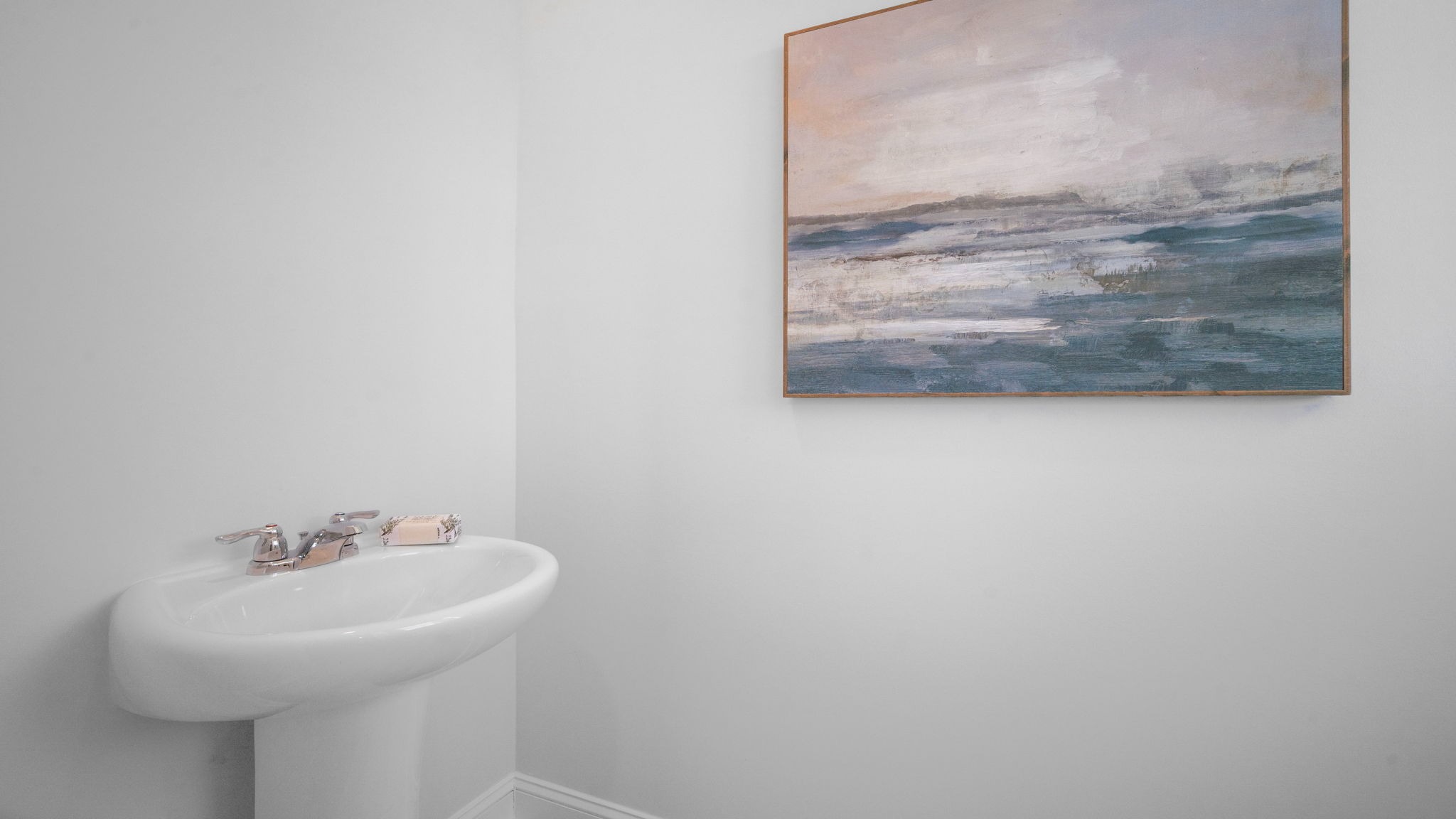 “Convenient main level powder room in Manning DR Horton home with functional layout for guests.”