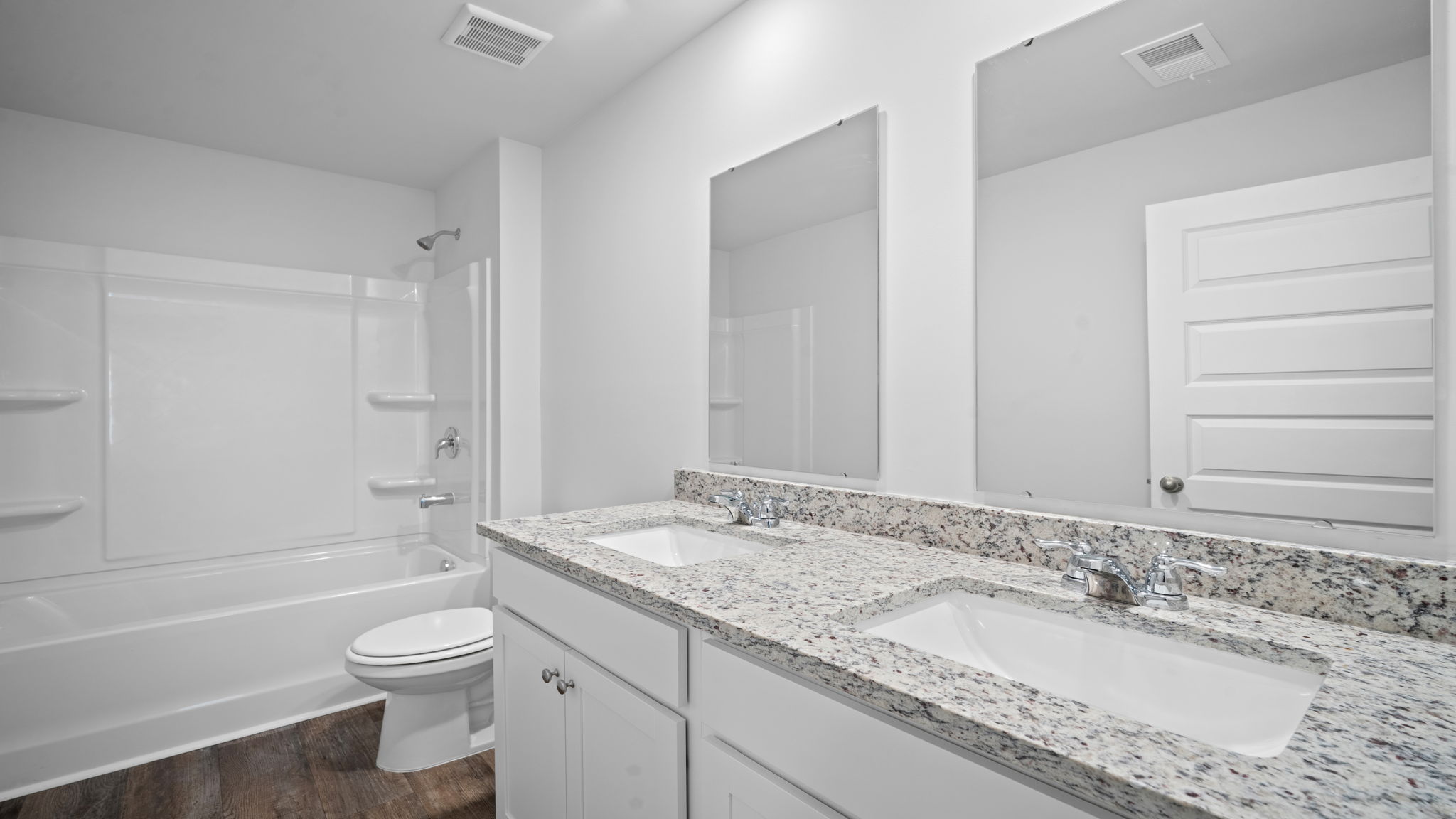 Guest bathroom with a tub shower