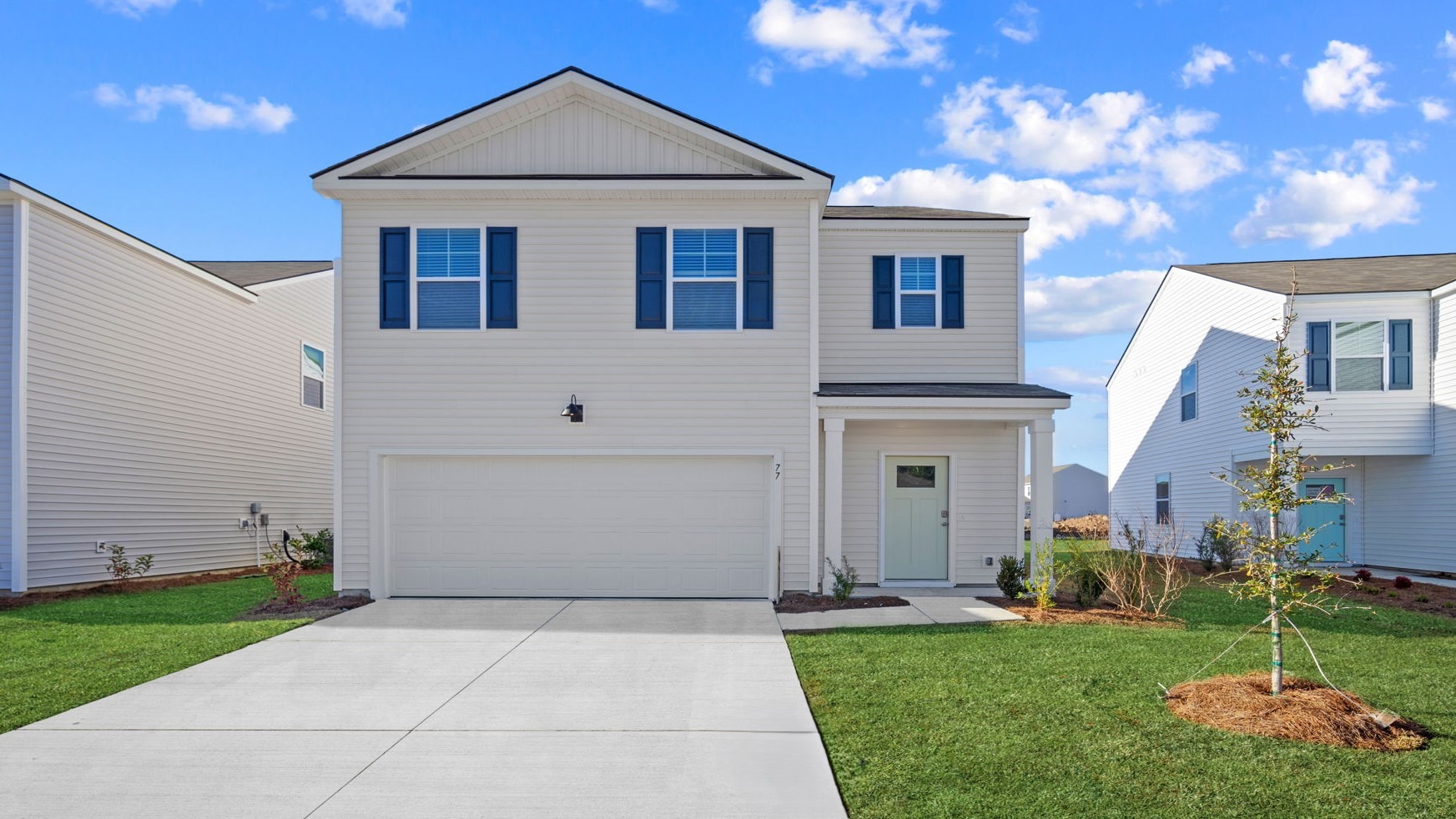 D.R. Horton Robie floorplan exterior at The Retreat at East Argent in Ridgeland SC featuring two‑story design, inviting entry, and 2‑car garage