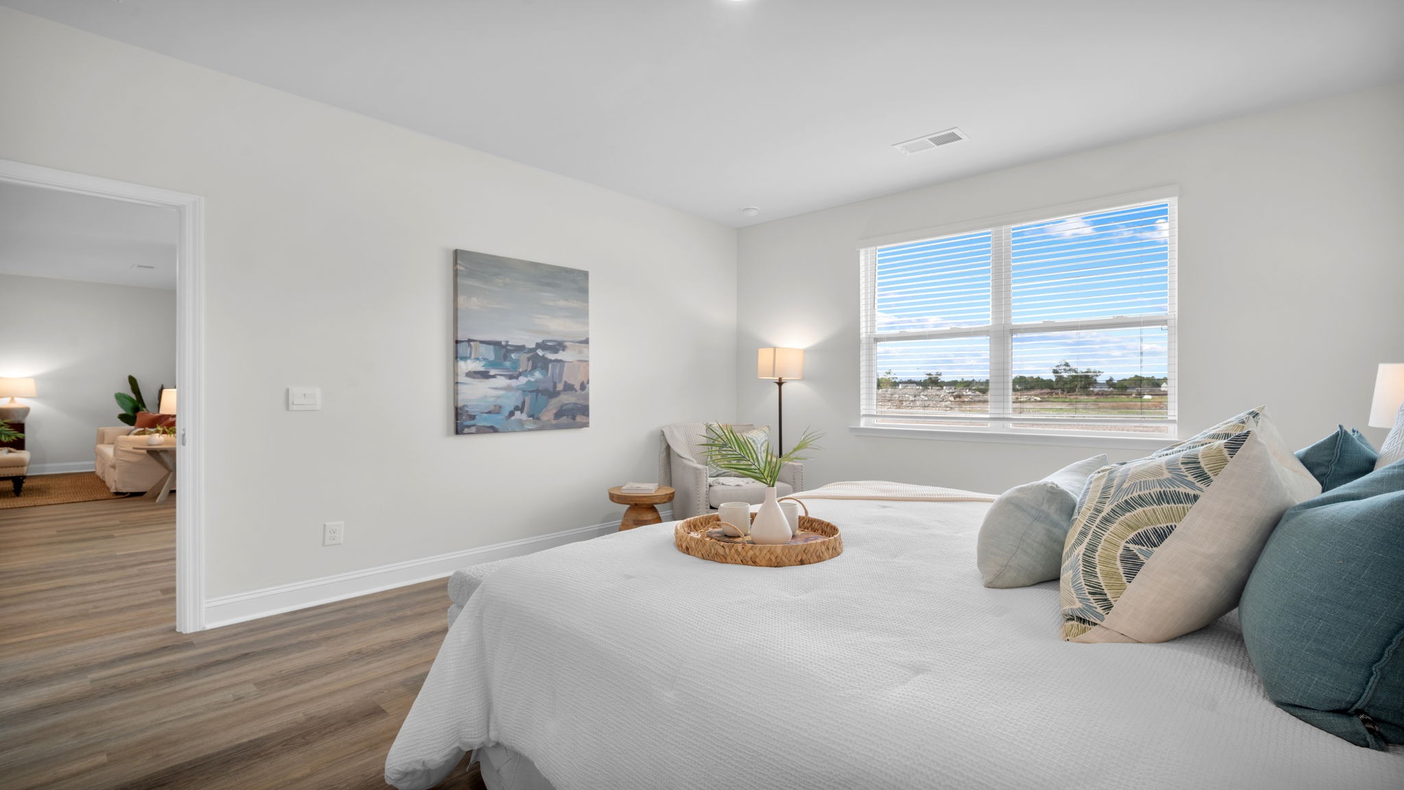 Spacious primary suite in the Aria floor plan featuring abundant natural light, a private retreat atmosphere, and room for a king-size bedroom set.