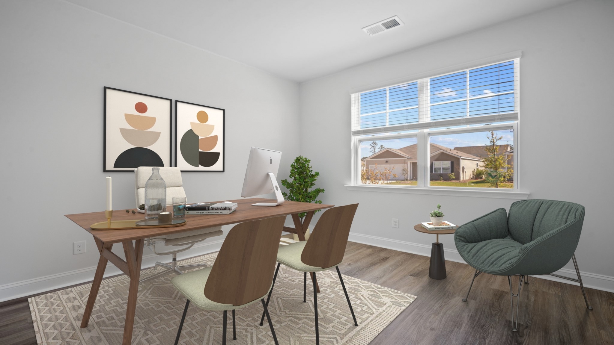 Comfortable secondary bedroom in the Aria floor plan featuring natural light, ample closet space, and versatile living options.