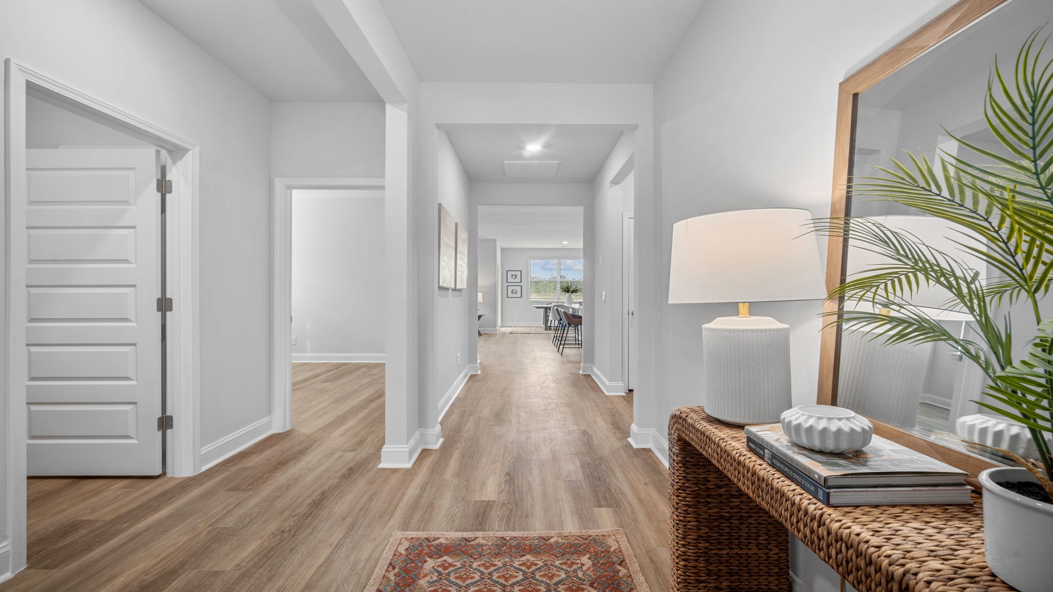 Welcoming foyer in the Aria floor plan showcasing an open-concept design, modern finishes, and seamless access to the home's spacious living areas.