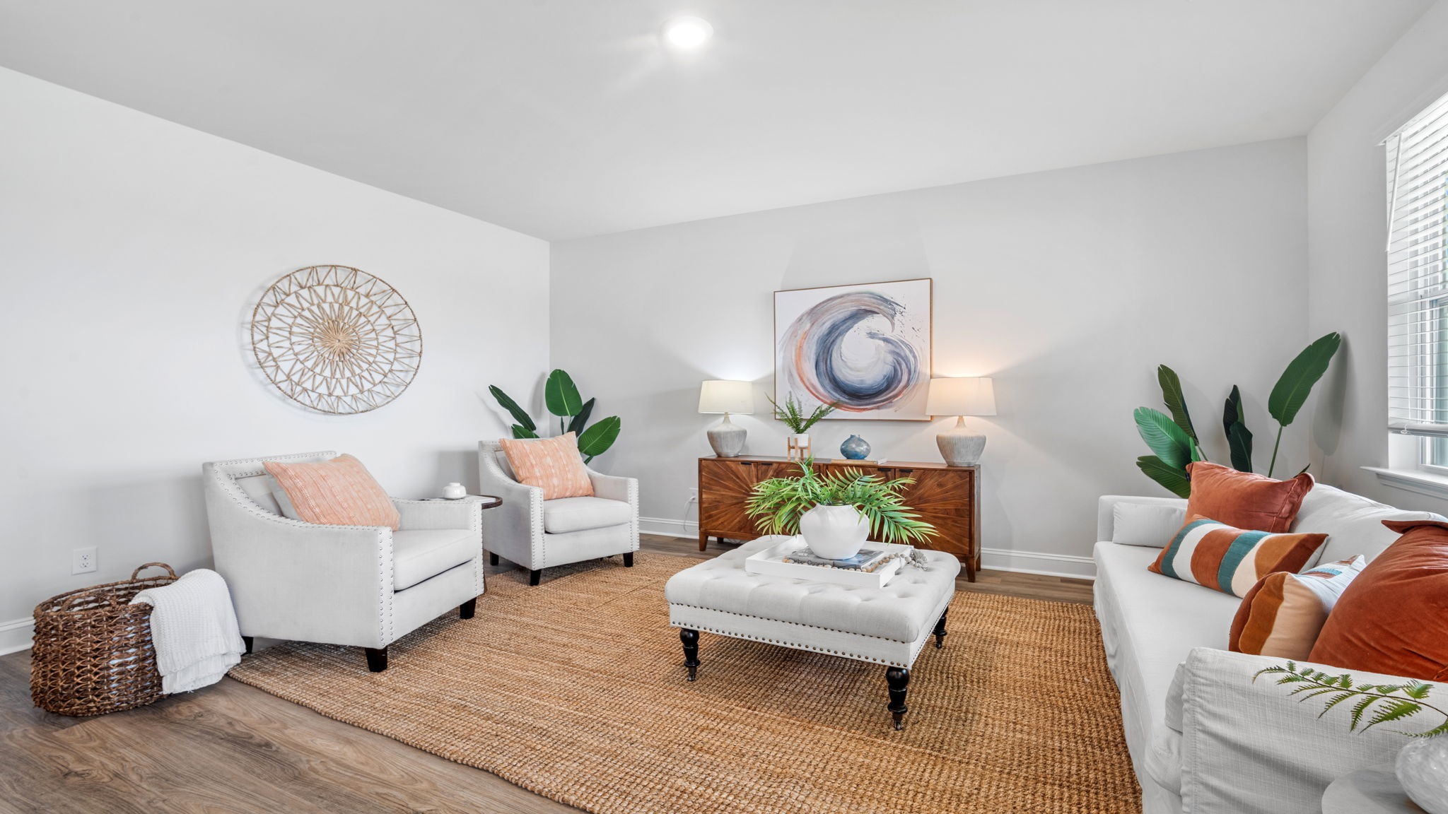 Inviting great room with beautiful sightlines, modern finishes, and seamless connectivity to the kitchen and dining area.