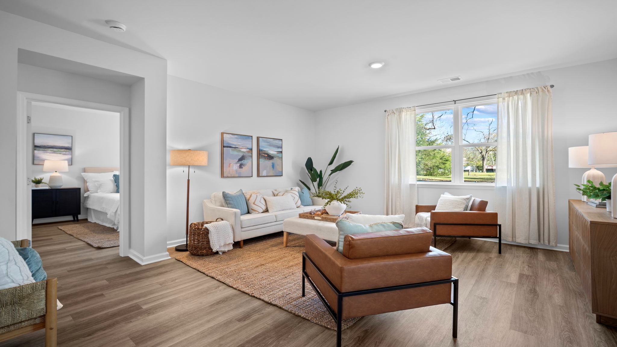 Bright and inviting great room designed for comfortable family living and entertaining guests.