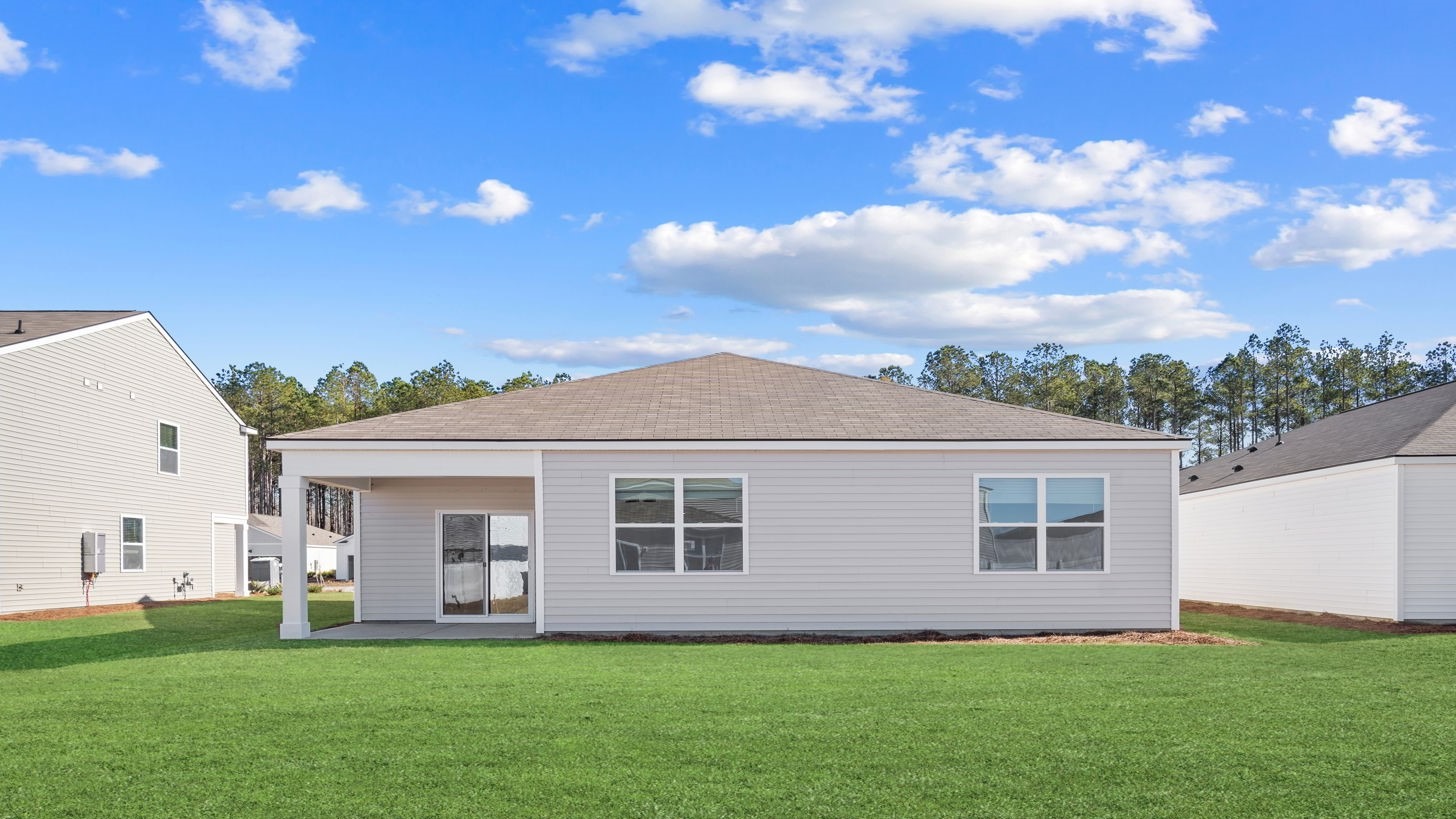 rear of home with covered patio