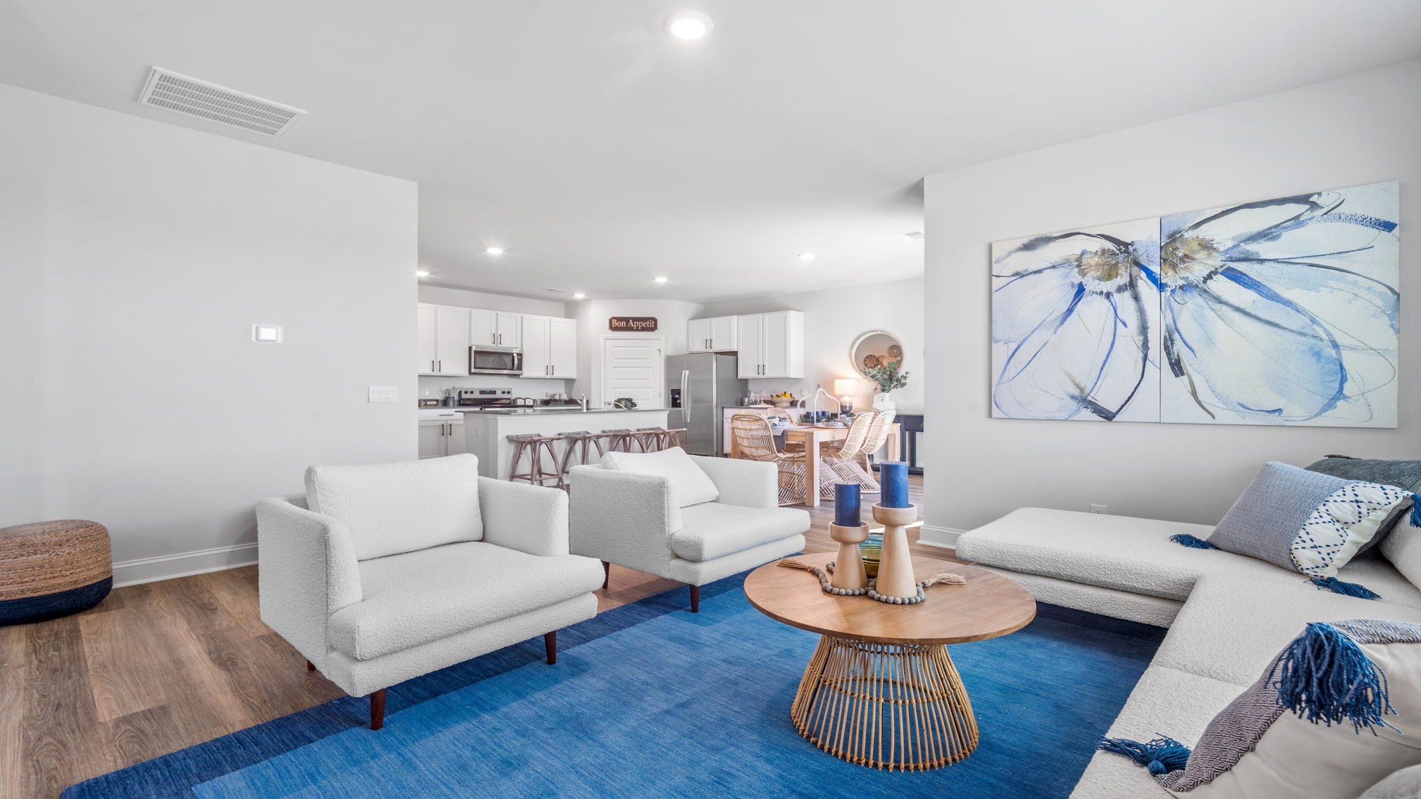 Spacious great room in the Cali floor plan featuring an open layout, abundant natural light, and comfortable gathering space for family and friends.