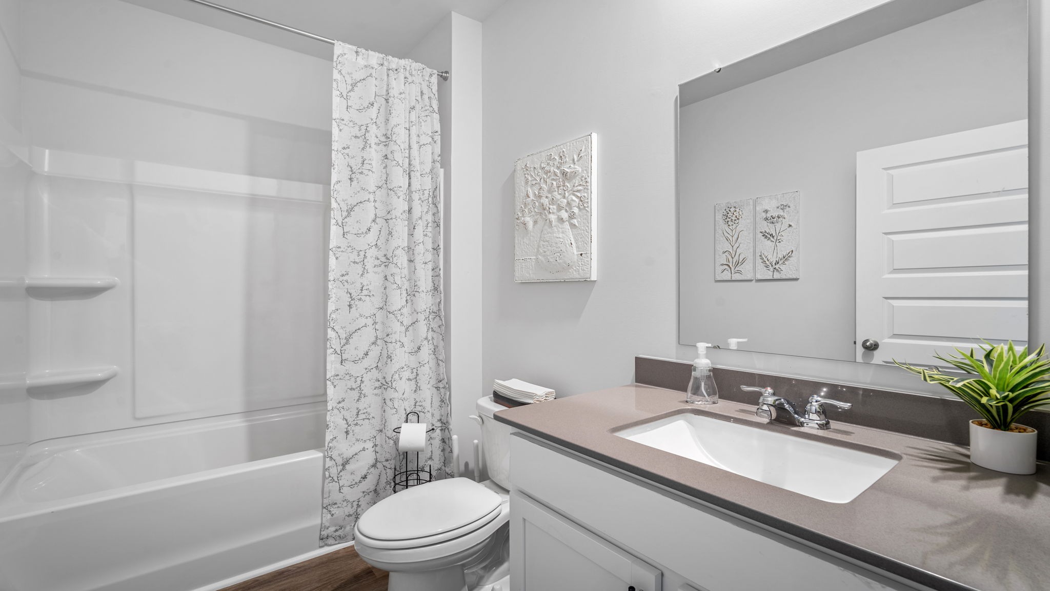 Modern guest bathroom featuring updated fixtures, functional design, and convenient access for family and visitors.