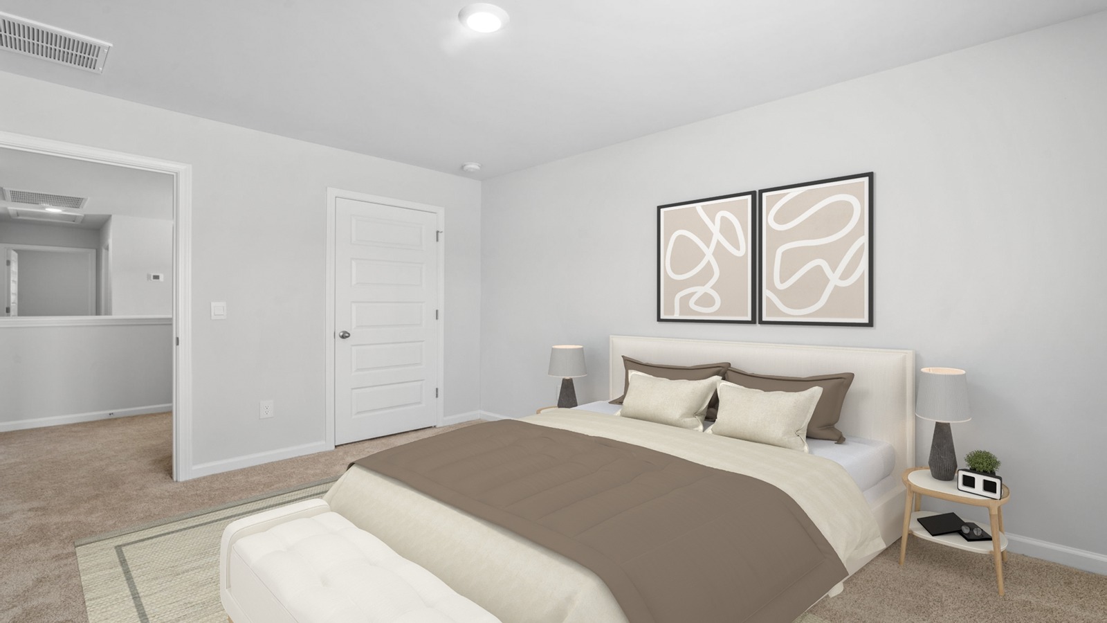 Guest bedroom decorated with a bed and side table