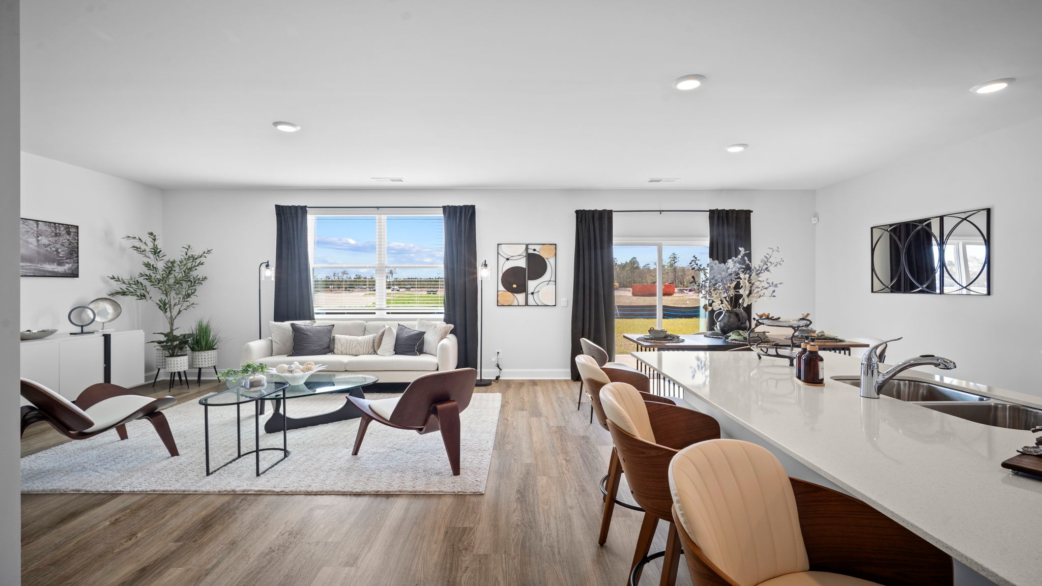 Spacious dining space connecting the kitchen and gathering room for effortless entertaining.