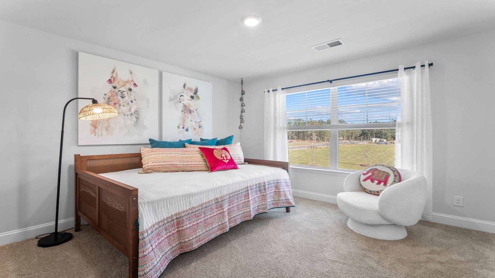 Comfortable secondary bedroom featuring closet storage, natural light, and flexible functionality.
