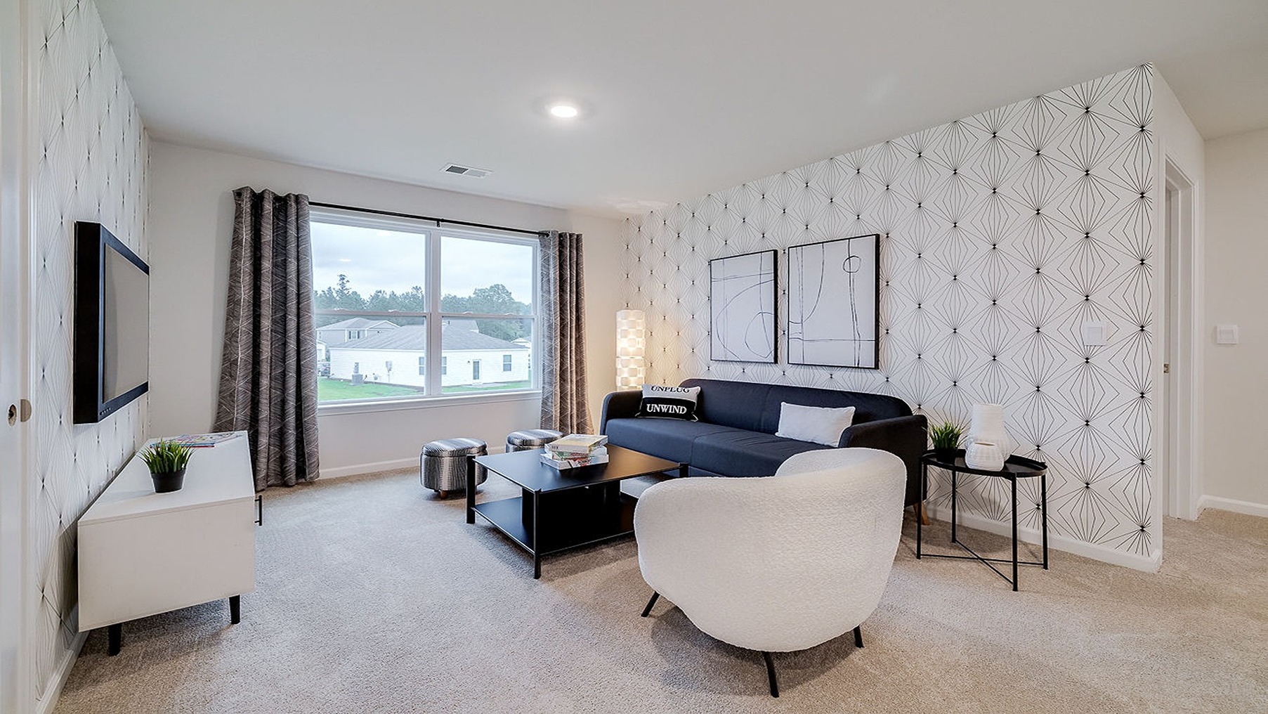 Upstairs living room decorated as a sitting room