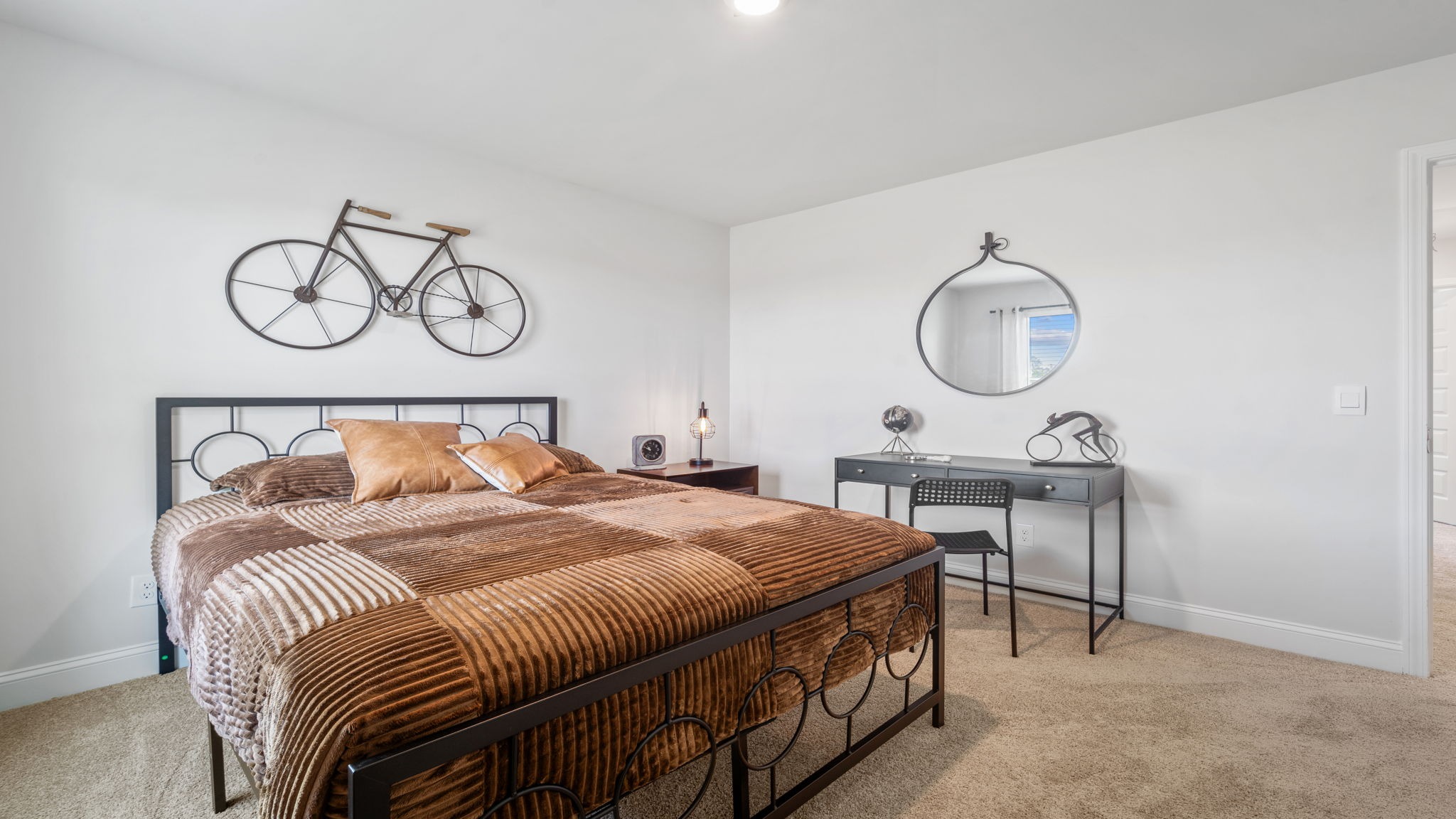 “Secondary bedroom in Hayden floor plan ideal for guests, children, or home office in DR Horton East Argent.”
