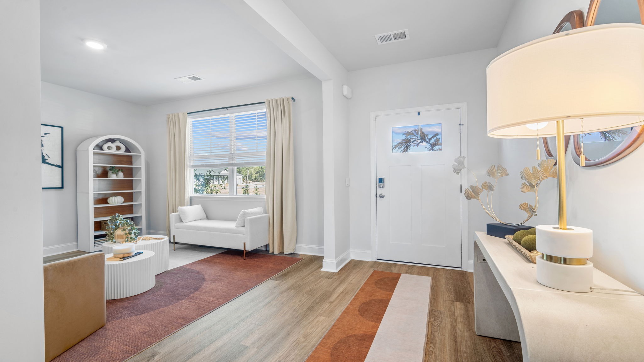 Bright entryway creating a warm first impression and showcasing the open-concept design of the Hayden floor plan.