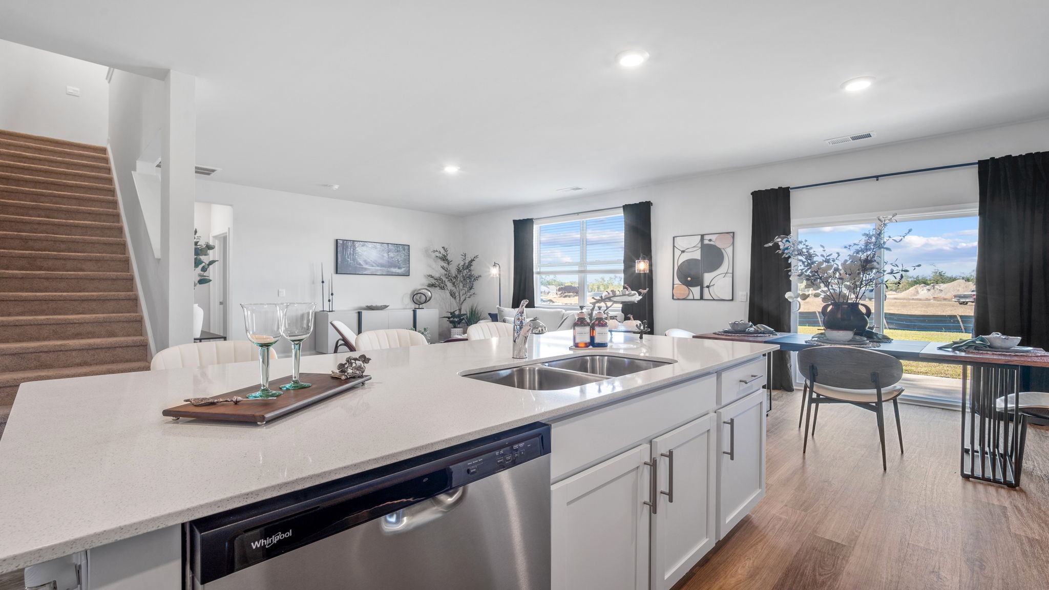 Expansive kitchen island in the Hayden floor plan offering additional seating, generous prep space, and a central gathering point for entertaining.