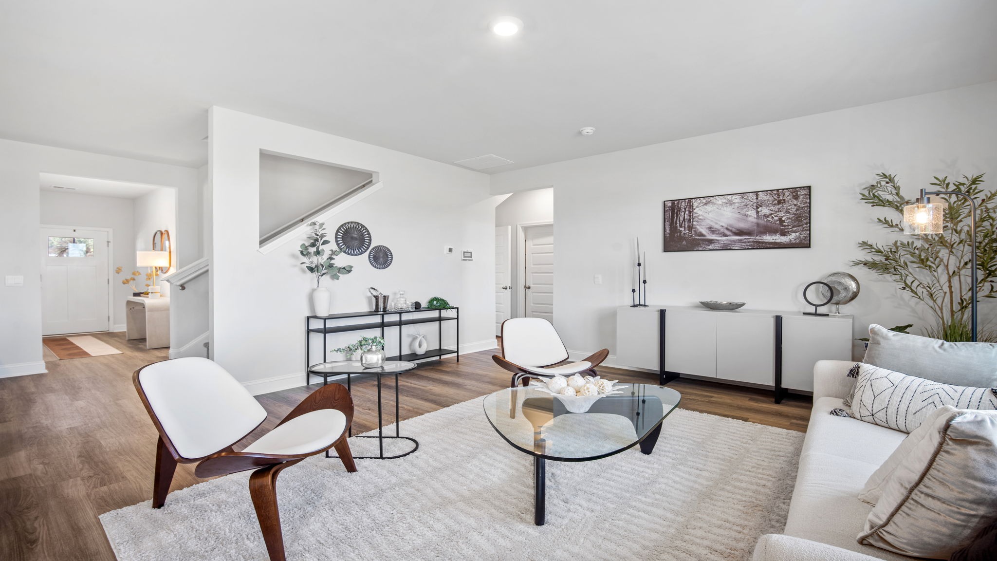 Spacious family room in the Hayden floor plan featuring open-concept living, abundant natural light, and comfortable gathering space.