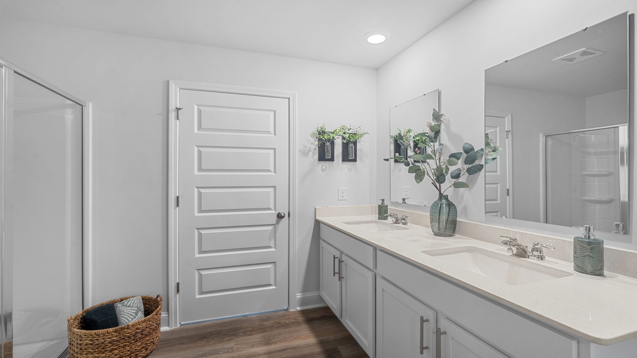 Beautiful primary bathroom designed as a relaxing retreat with contemporary finishes and functional storage.