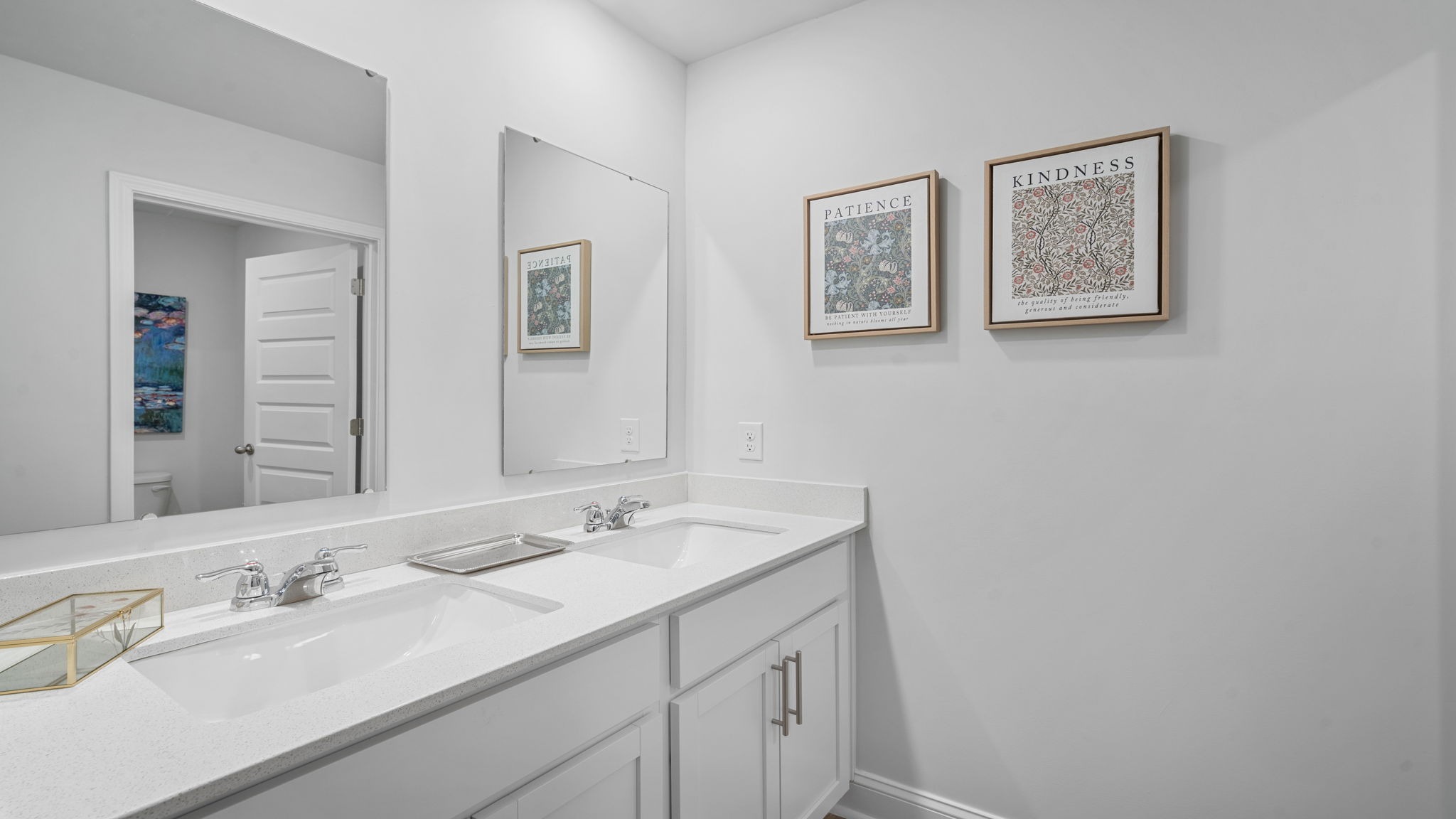 Stylish guest bathroom featuring contemporary fixtures, functional design, and convenient access for family and visitors.