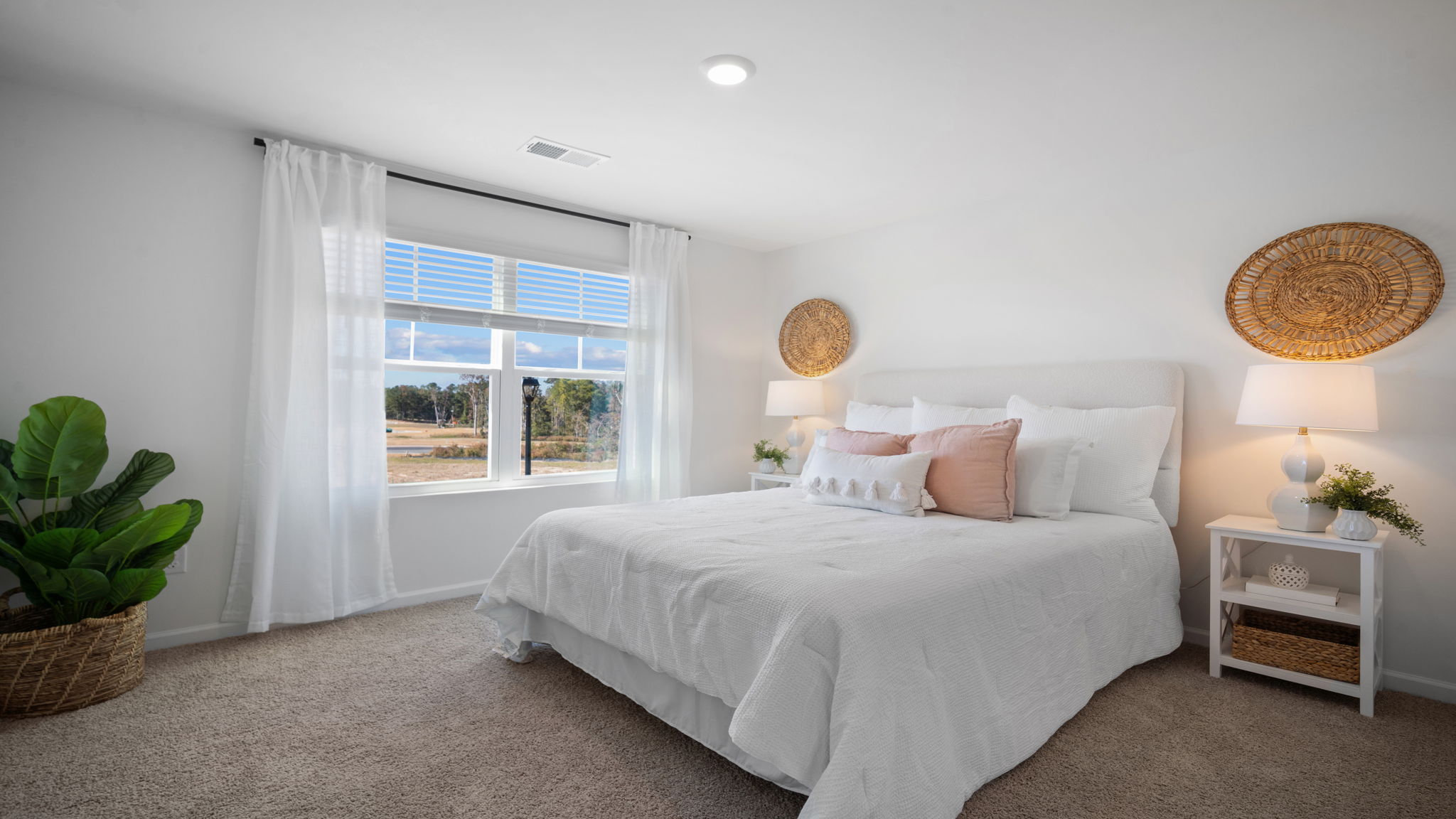 Guest bedroom with a bed and a chair