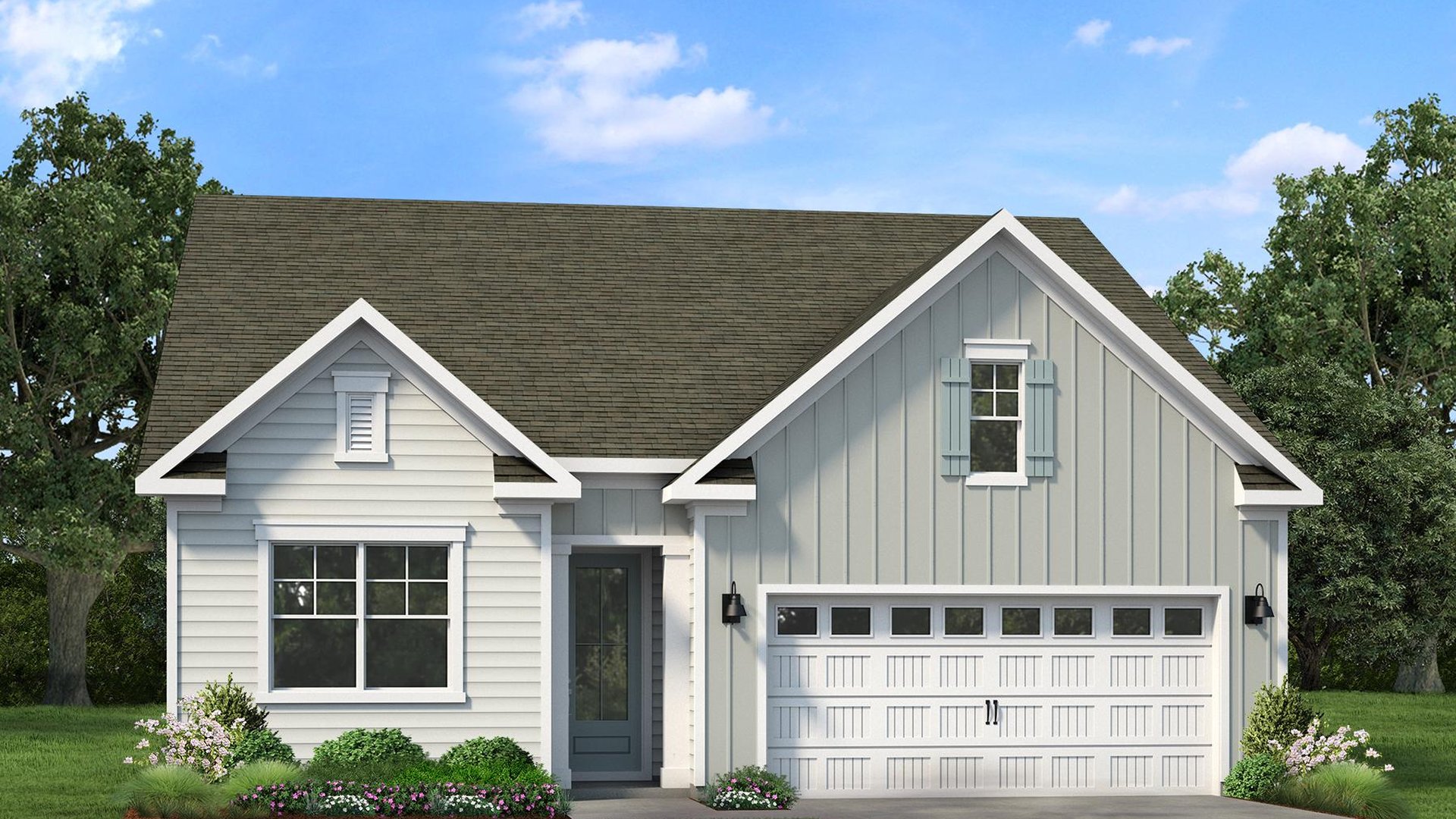 Front exterior of the Aria F floor plan featuring a spacious two-car garage, covered entry, and attractive curb appeal in The Sanctuary at East Argent.