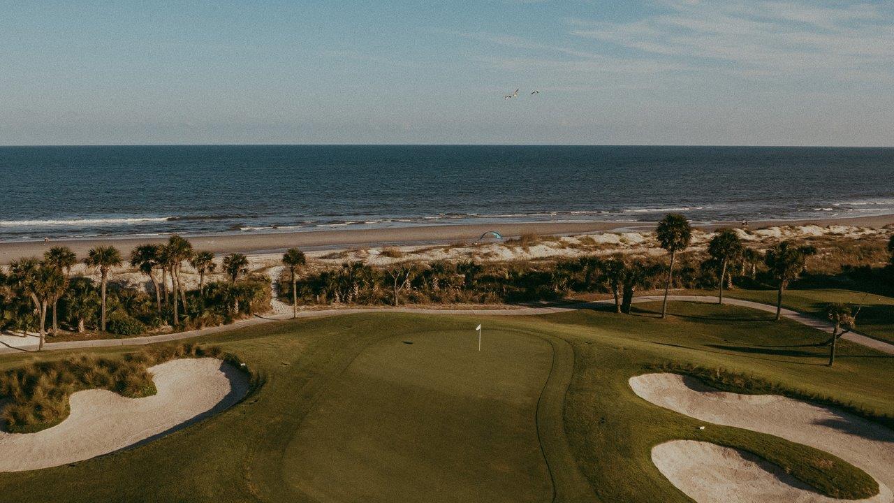 Golf course by water