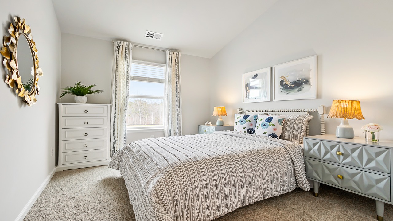 Guest bedroom in the Denmark home designed for visitors, family members, or a private home office.