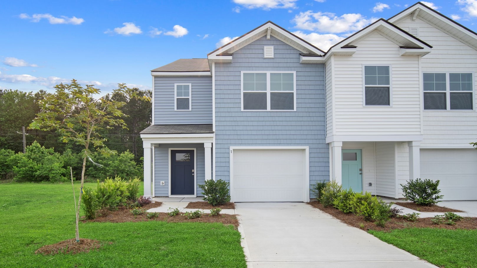 Denmark floor plan in Old Bailey by D.R. Horton featuring modern curb appeal, attractive exterior finishes, and a welcoming front entrance.