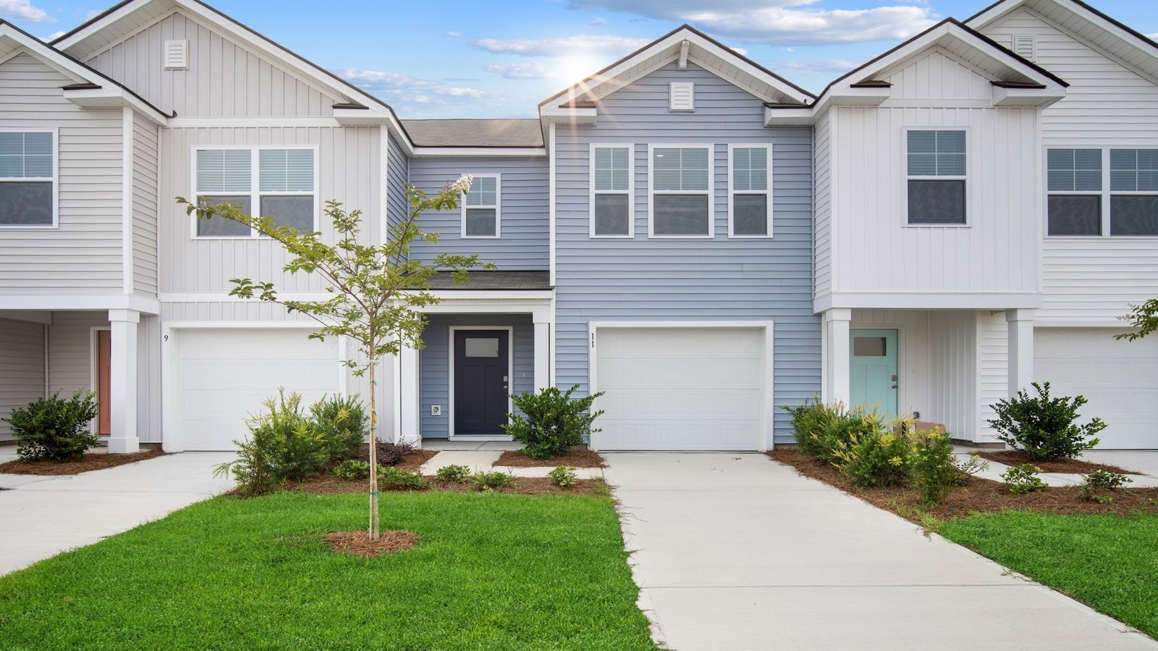 Denmark floor plan in Old Bailey by D.R. Horton featuring modern Lowcountry architecture, beautiful curb appeal, and professionally landscaped surroundings.
