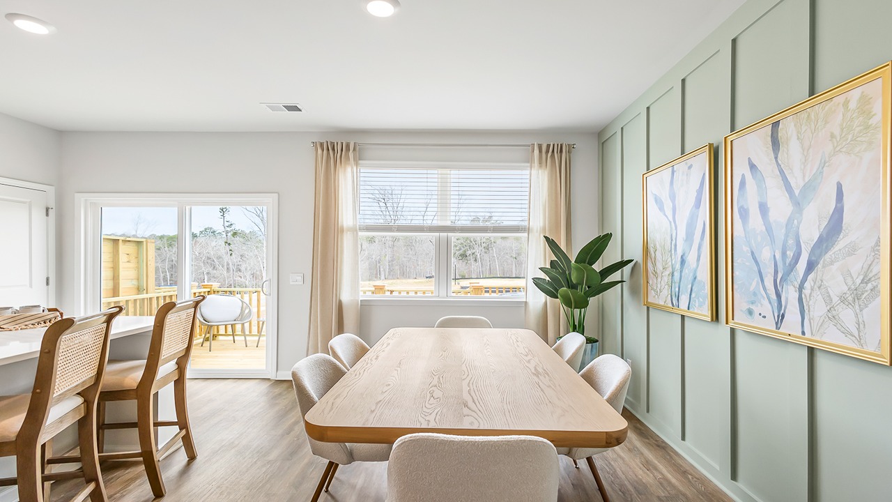 Dining area in the Denmark floor plan featuring an open layout, modern design, and seamless connection to the kitchen and living room.
