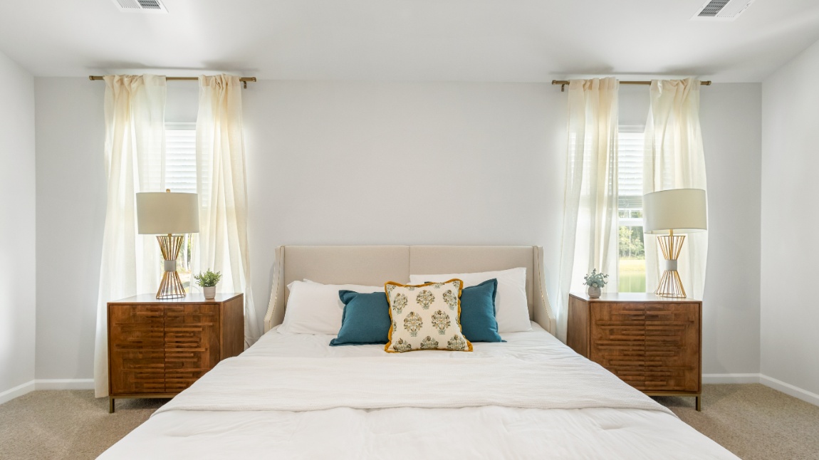 Owner's suite in the Davis home offering comfort, privacy, and thoughtfully designed living space.