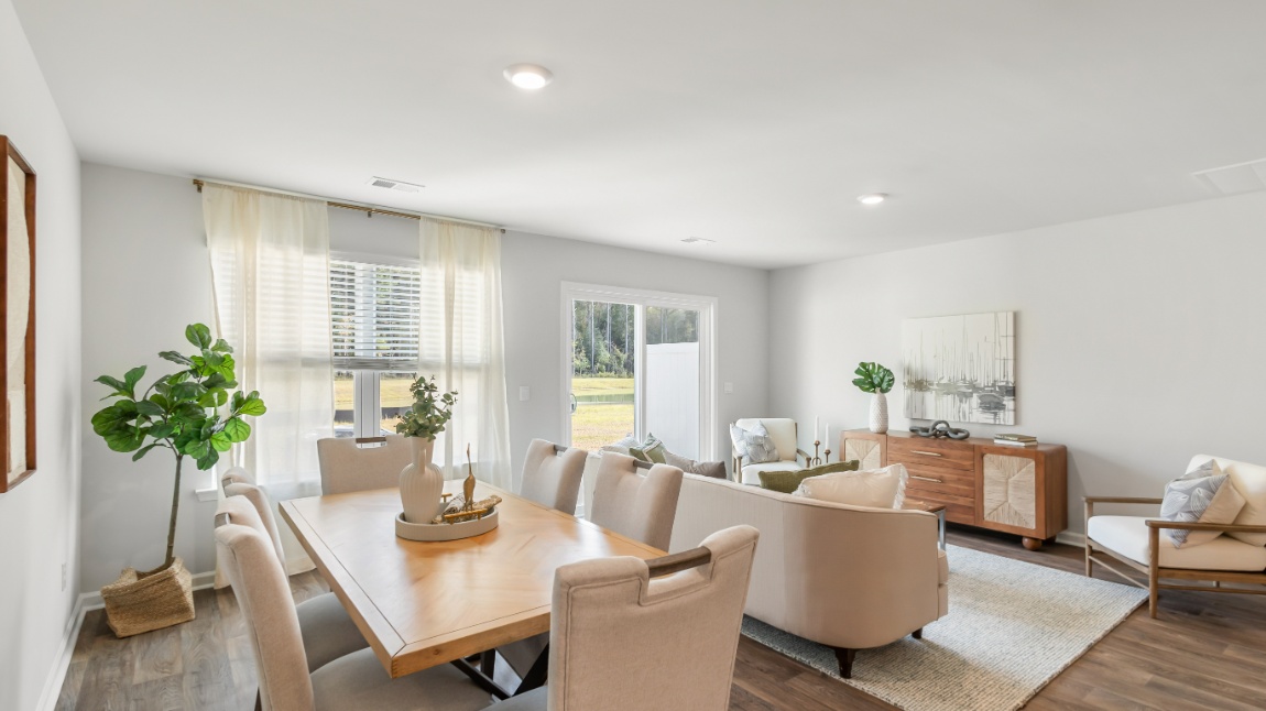 Spacious dining room in the Davis home perfect for family meals, holiday gatherings, and entertaining guests.