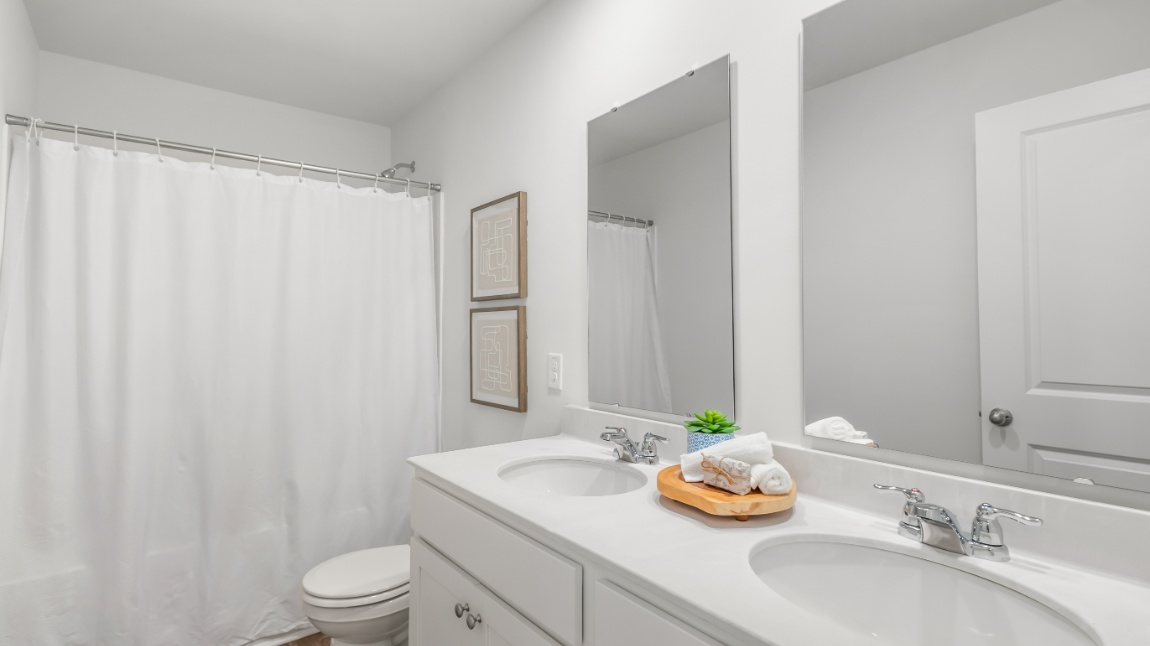 Guest bathroom in the Davis floor plan at Old Bailey featuring a modern vanity, stylish finishes, and functional design.