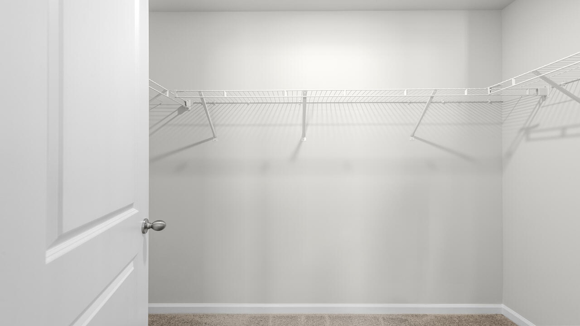 Large walk-in closet in the Norman floor plan providing generous storage space and convenient access from the primary suite.
