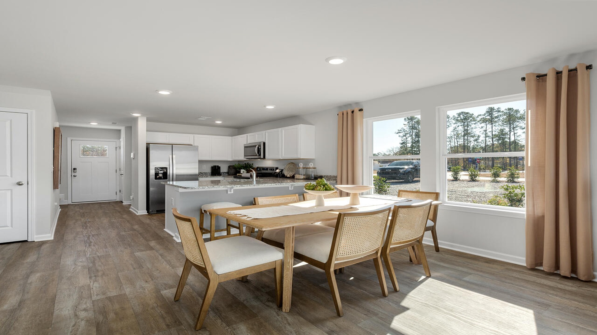 Spacious dining area in the Norman home designed for family meals, entertaining guests, and special occasions.