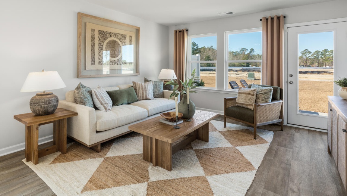 living area with door to back patio