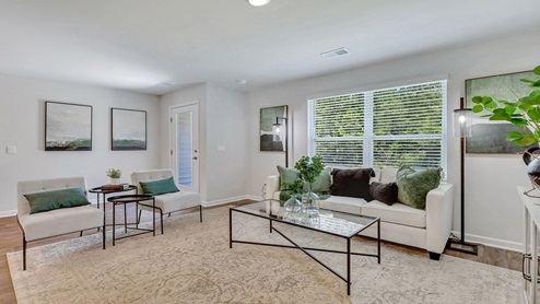 living room with back door to outside patio
