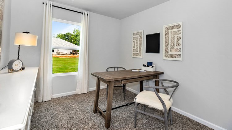 Guest bedroom decorated as an office