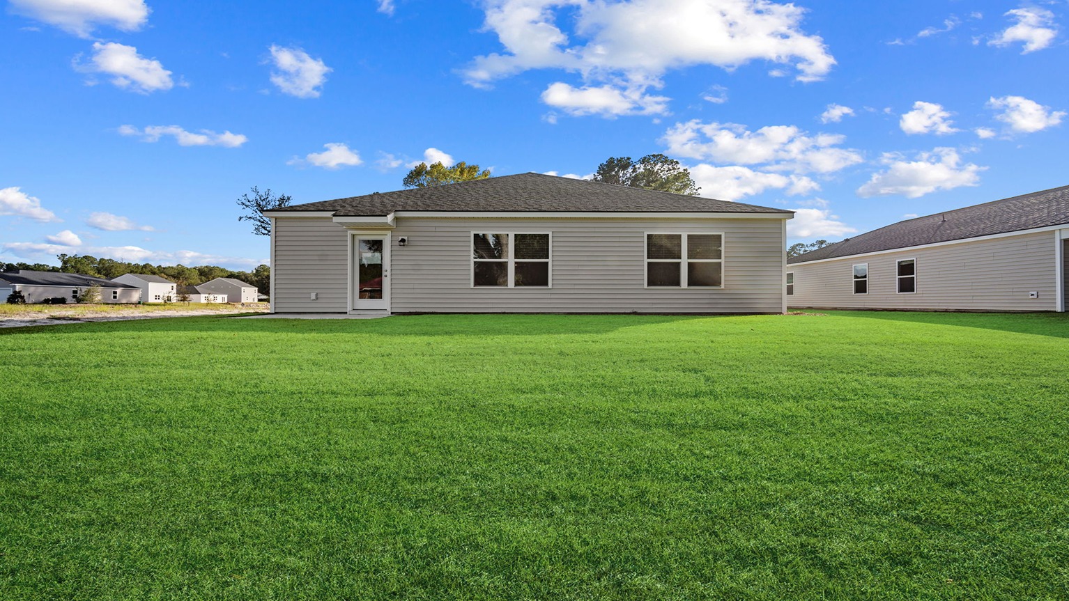 Rear of home freeport in Groves at Bees Creek