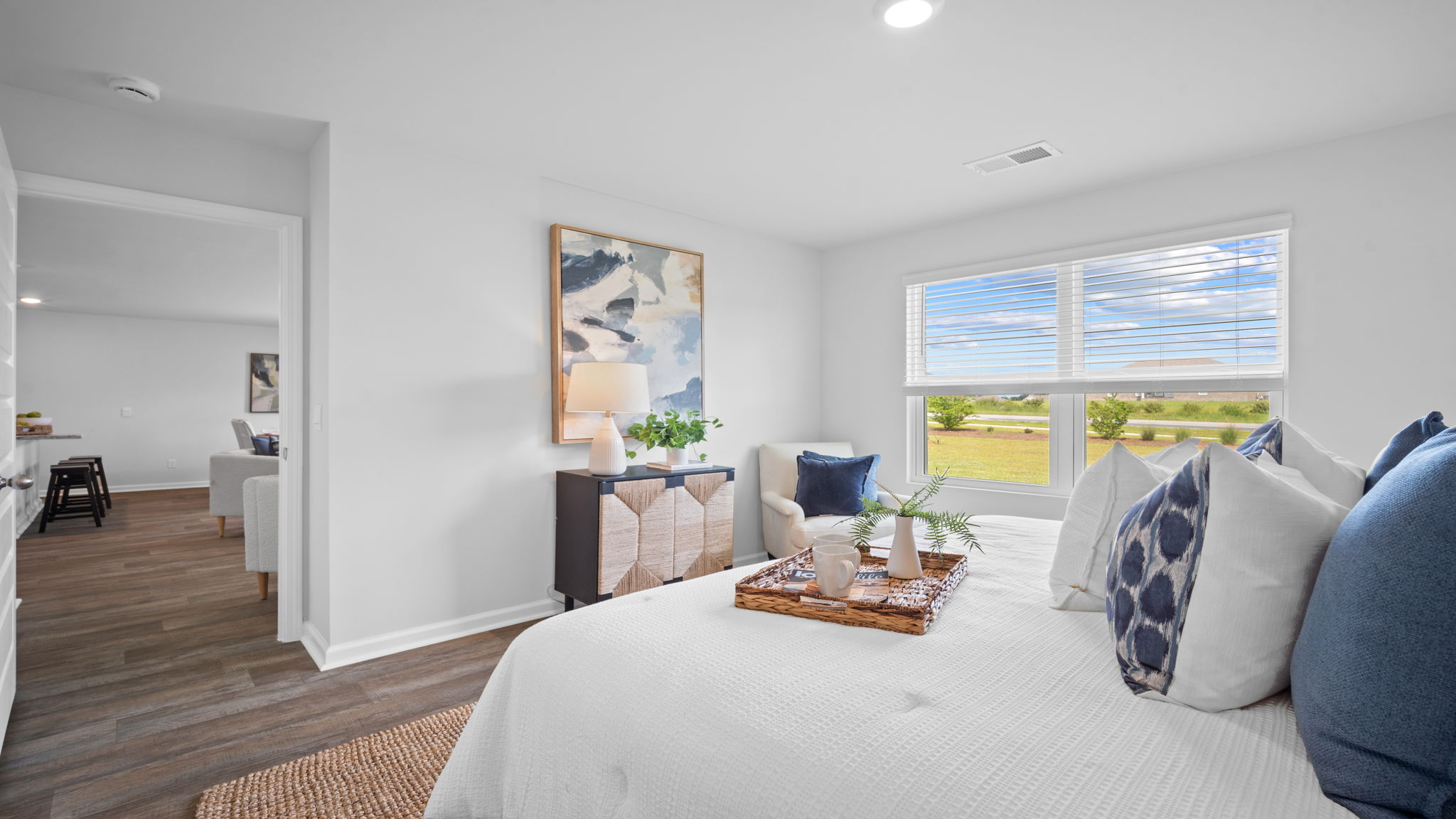 Owner's suite in the Freeport floor plan located at the rear of the home for added privacy