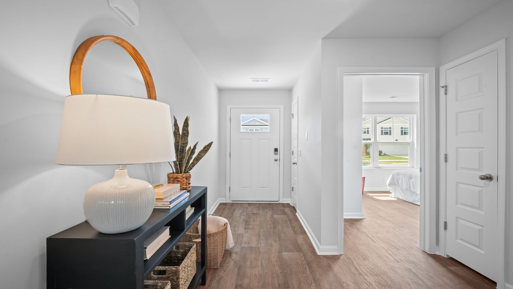 Welcoming foyer in the D.R. Horton Freeport floor plan featuring easy access to the open-concept living areas and bedrooms.