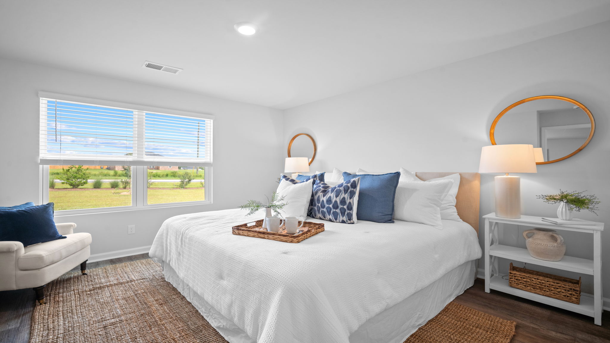 Private owner's suite featuring a spacious bedroom, large windows, and a relaxing retreat within the Freeport floor plan.