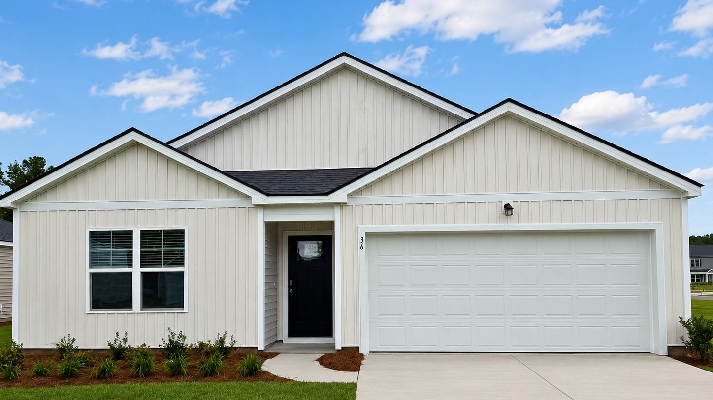 Freeport by D.R. Horton in The Groves at Bees Creek featuring charming Lowcountry curb appeal, modern exterior finishes, landscaped yard, and attached two-car garage in Ridgeland, SC.