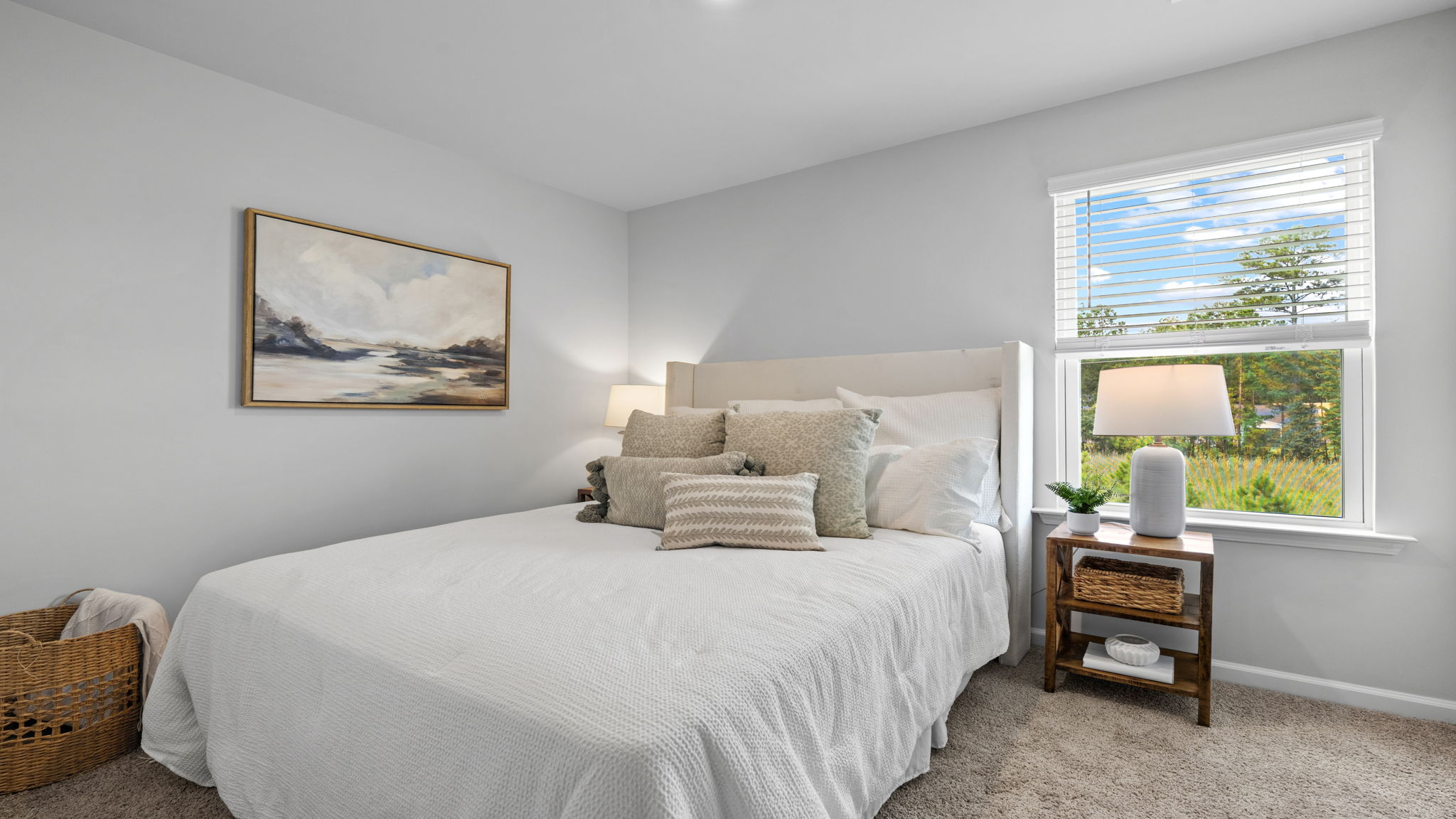 Bedroom with large window and natural light