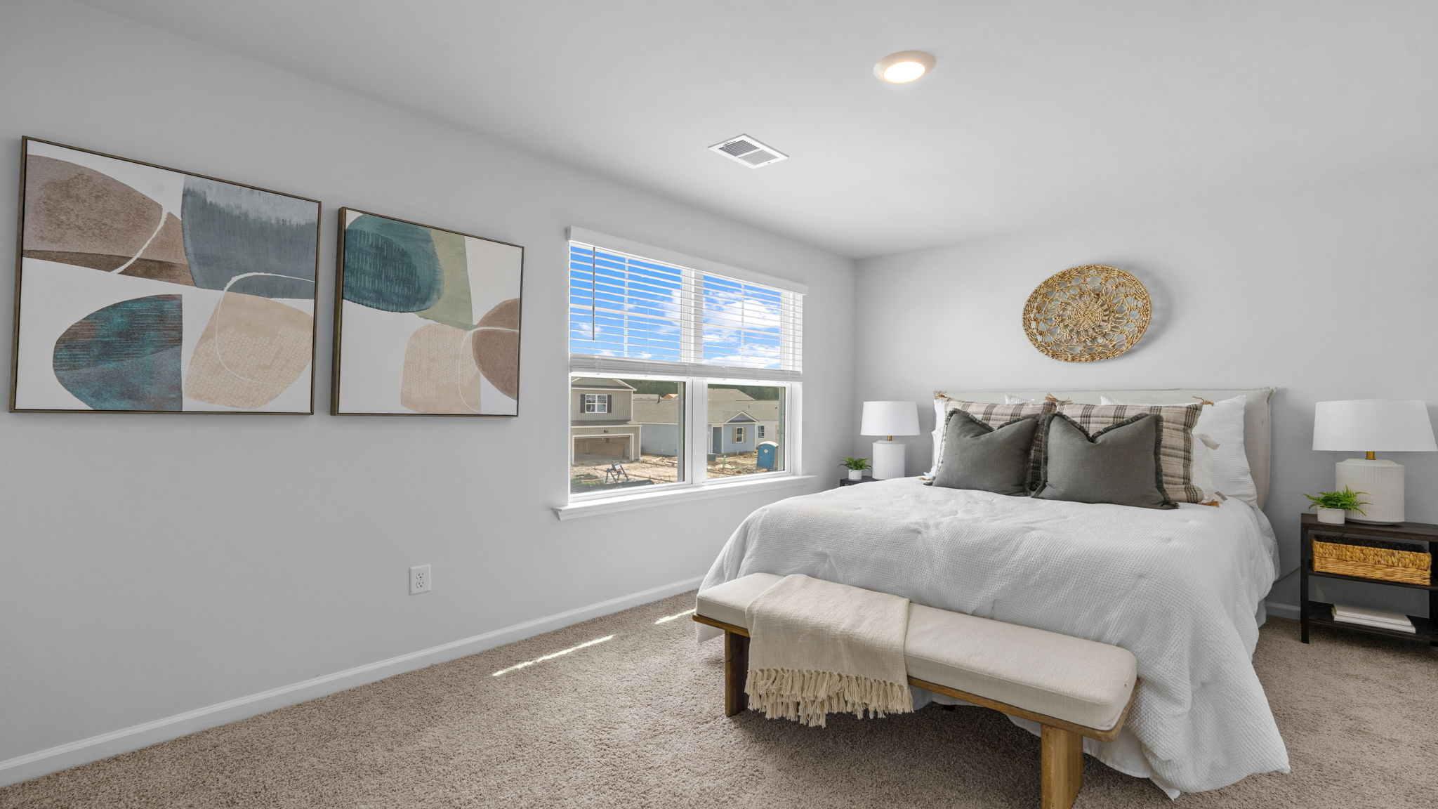 Spacious bedroom with multiple windows