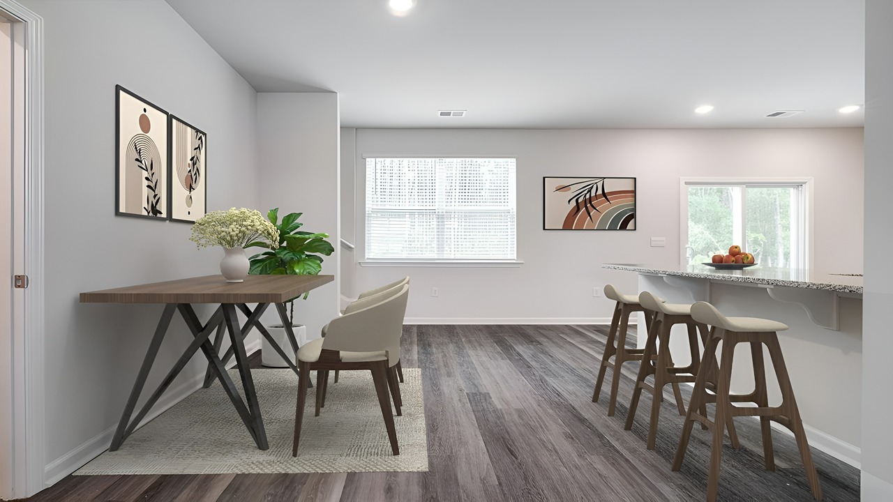Kitchen with a dining table and bar with seating
