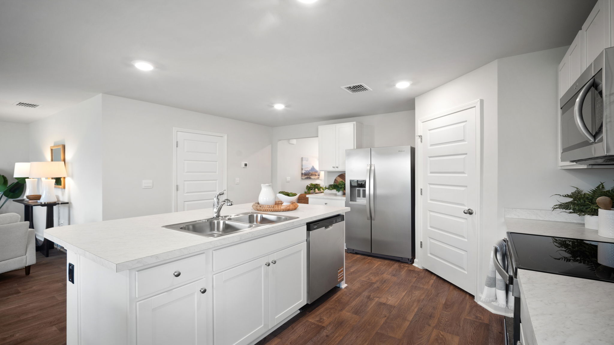 Open floor plan of the living, kitchen, and dining area. and dining area.