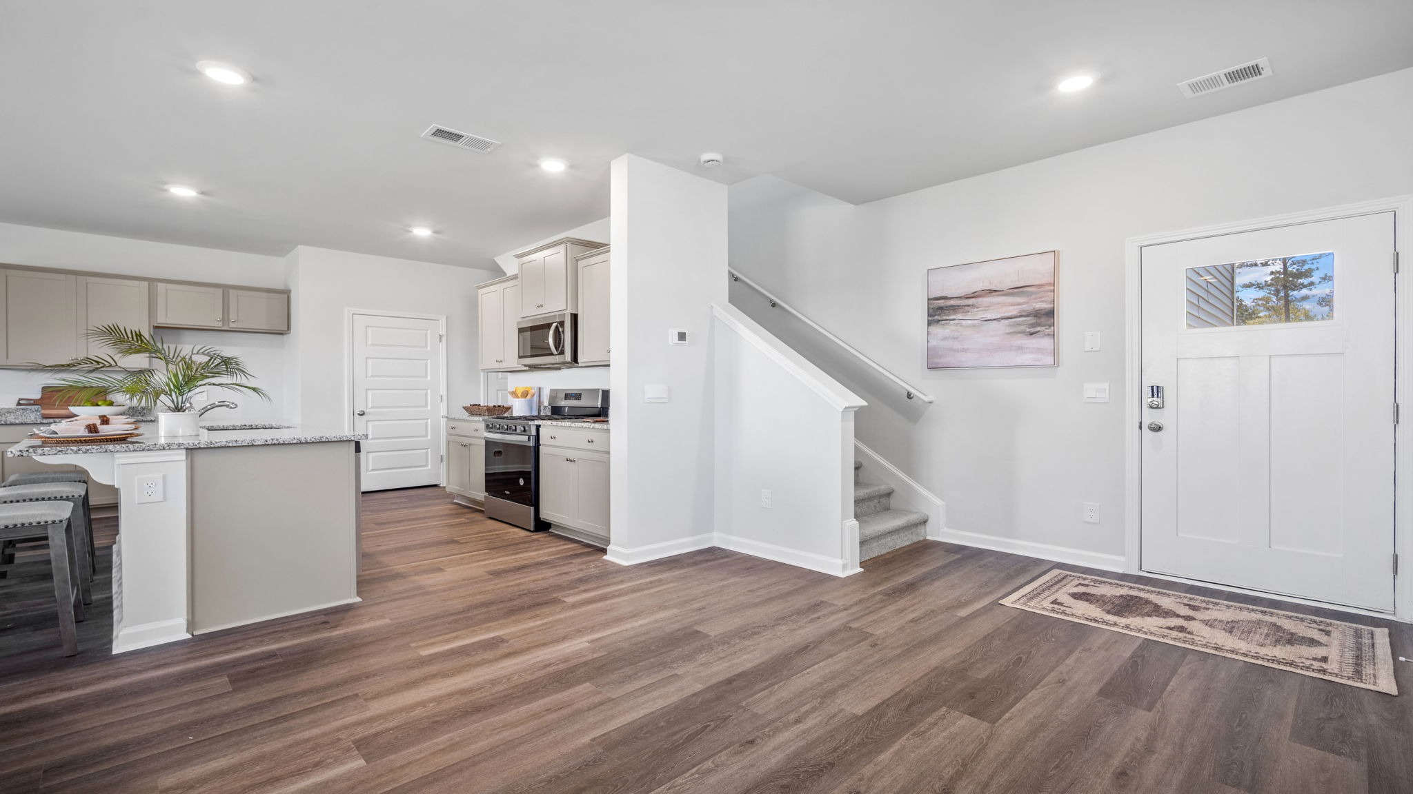 Foyer of home with a view of the front door